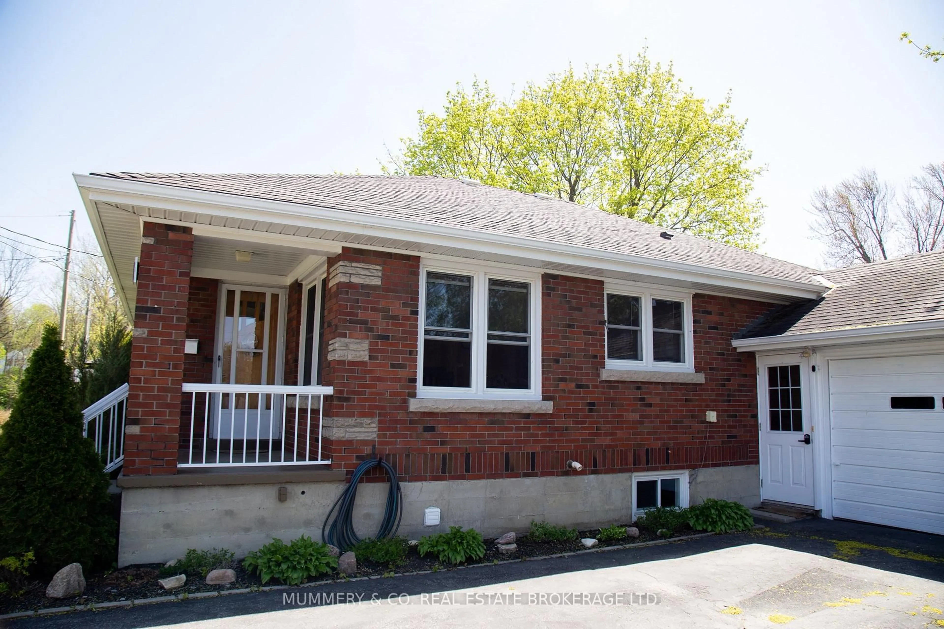 Home with brick exterior material, street for 42 Hawthorne Ave, Norfolk Ontario N3Y 2L9