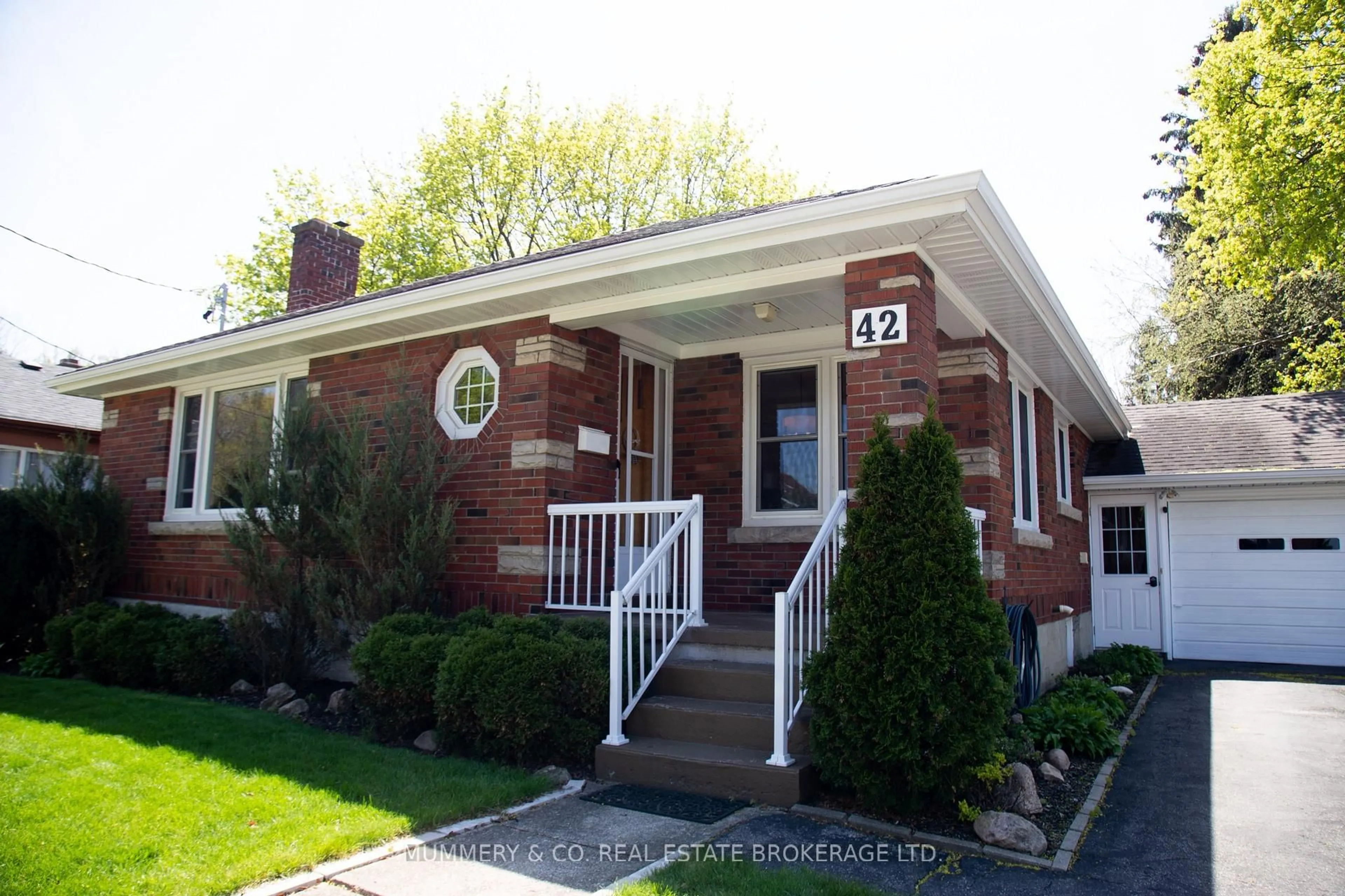 Home with brick exterior material, street for 42 Hawthorne Ave, Norfolk Ontario N3Y 2L9