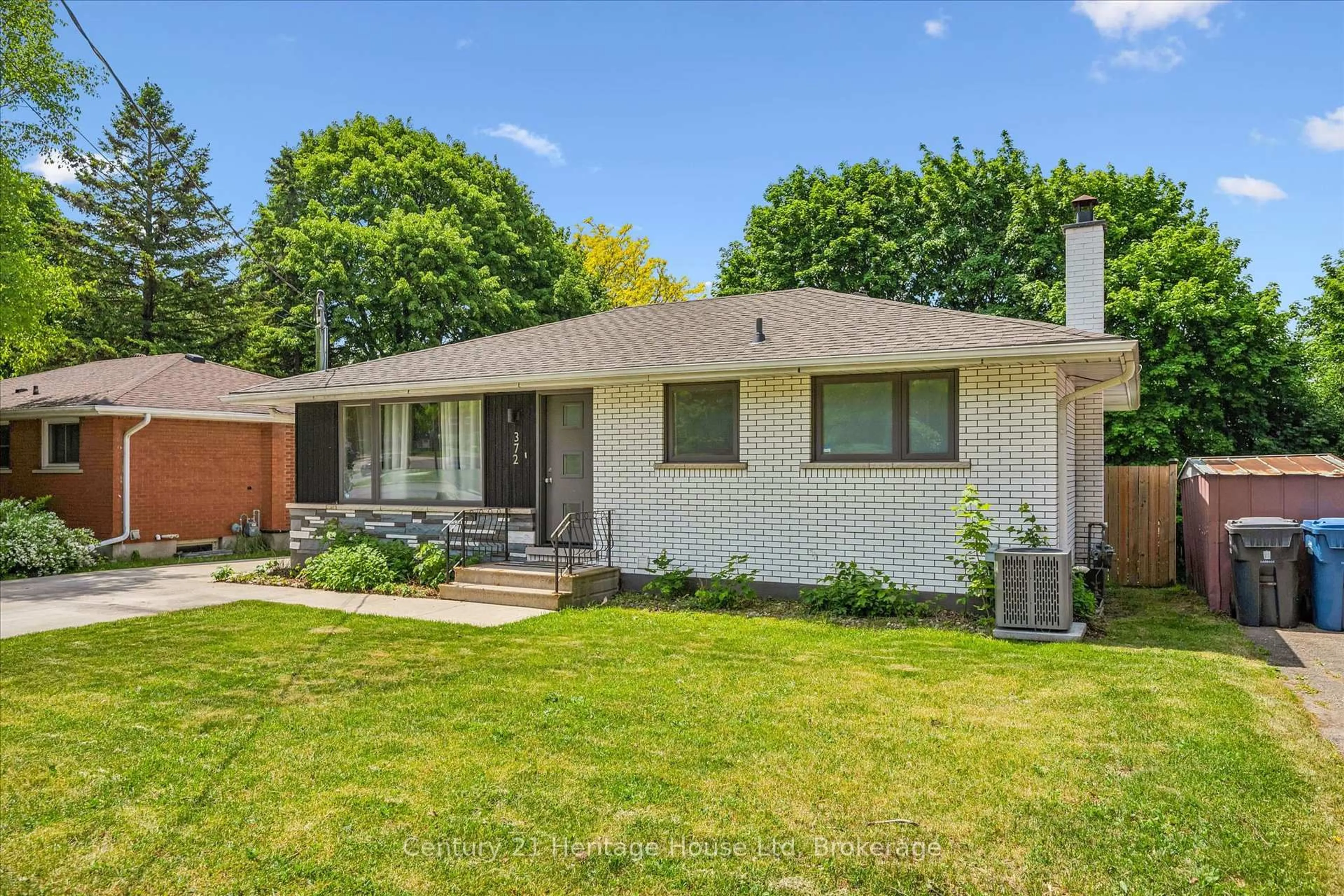 Home with brick exterior material, street for 372 Victoria Rd, Guelph Ontario N1E 5J7