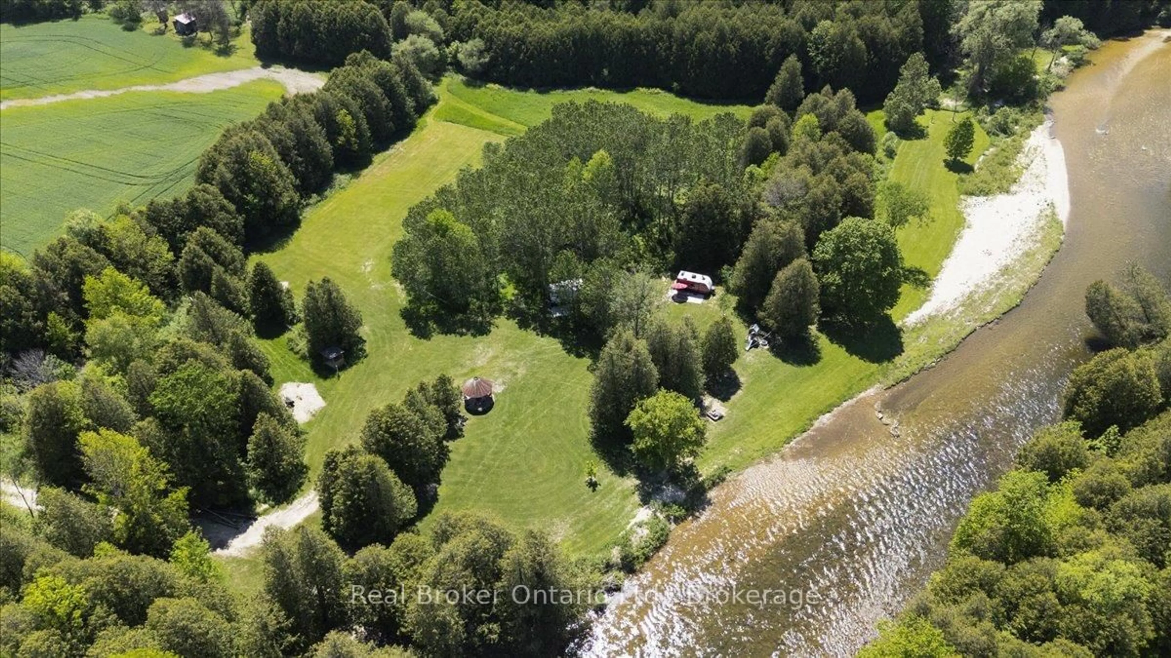 A pic from outside/outdoor area/front of a property/back of a property/a pic from drone, water/lake/river/ocean view for 401479 Grey Rd 4, West Grey Ontario N4N 3B8