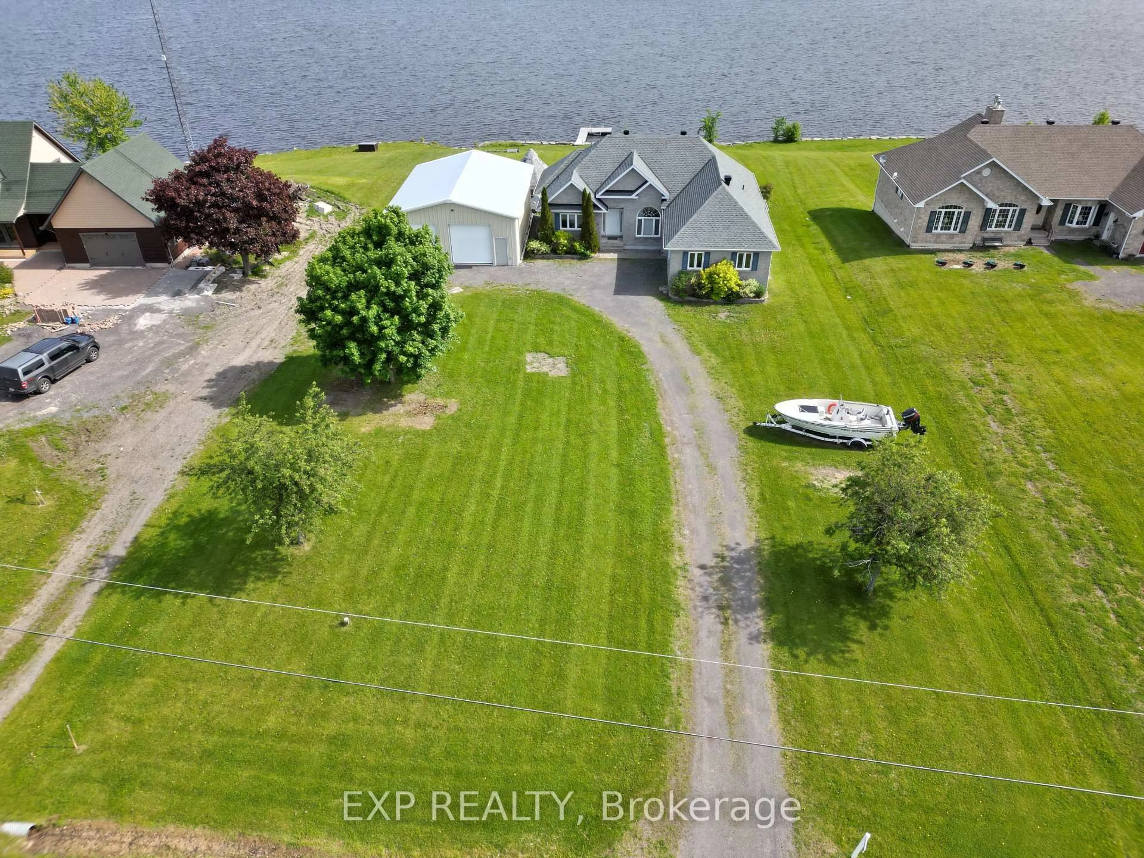 A pic from outside/outdoor area/front of a property/back of a property/a pic from drone, water/lake/river/ocean view for 15 Rue Haute Rive St, Alfred and Plantagenet Ontario K0B 1J0