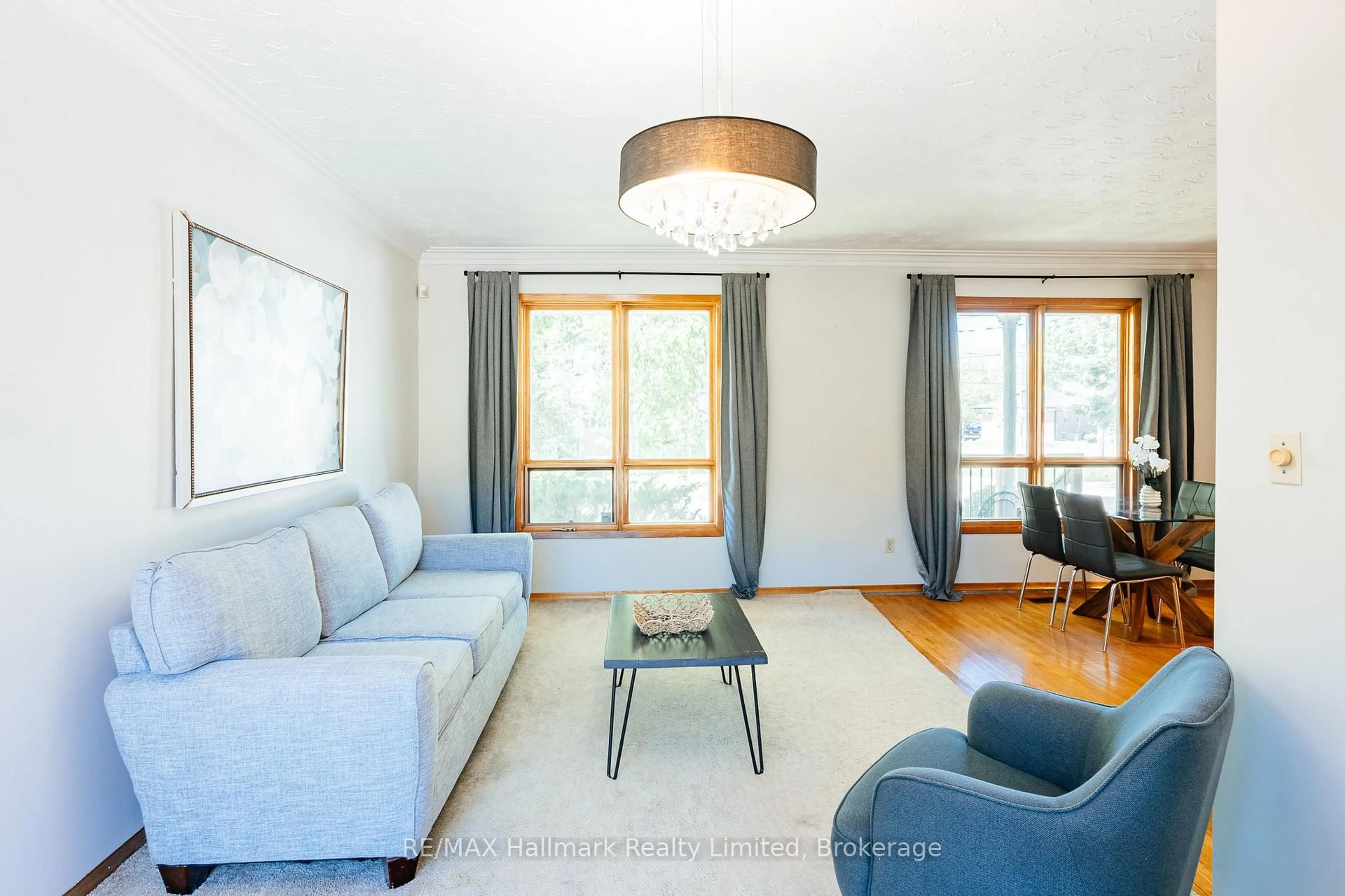 Living room with furniture, wood/laminate floor for 41 William St, Guelph Ontario N1E 5E2