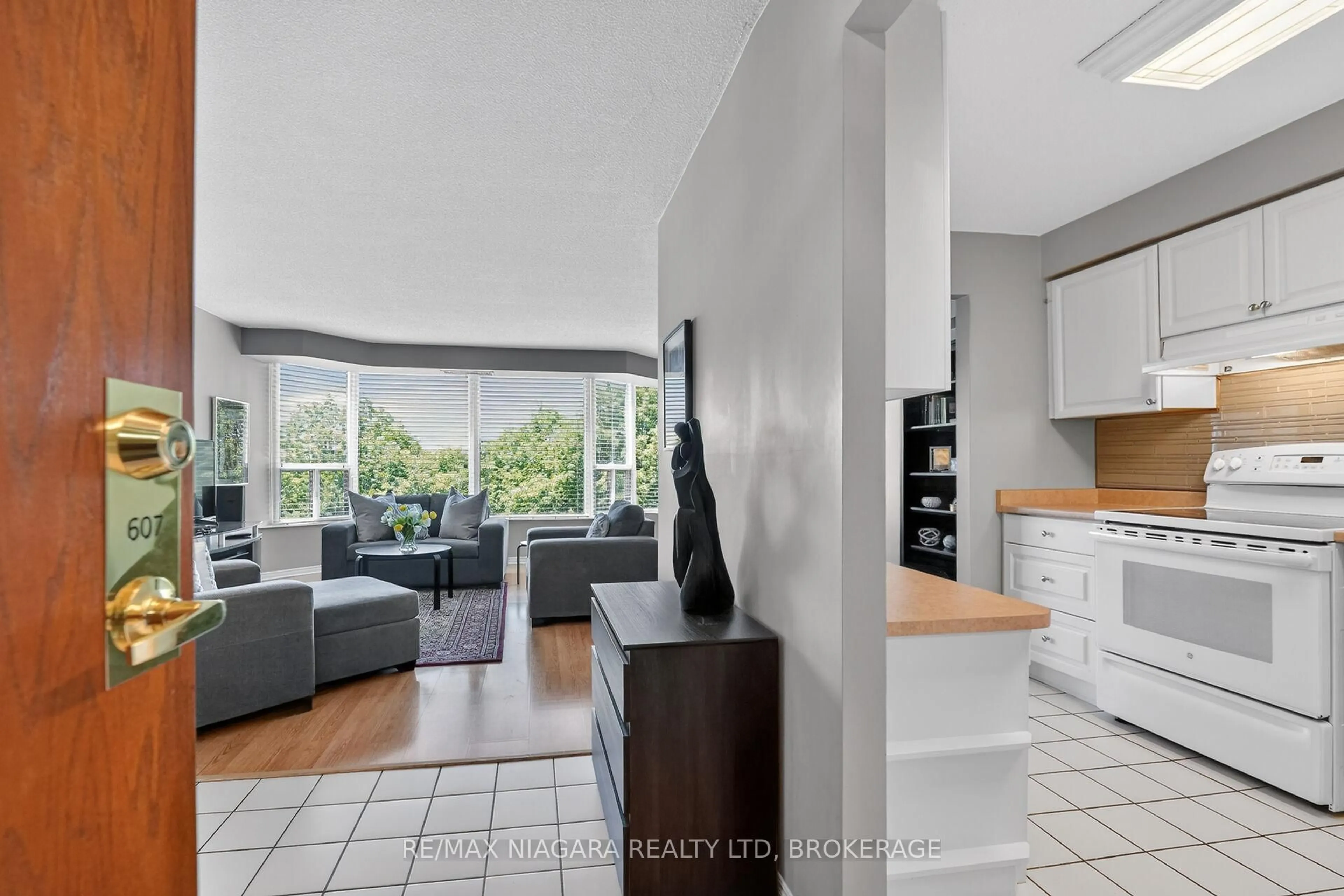 Open concept kitchen, ceramic/tile floor for 81 Scott St #607, St. Catharines Ontario L2N 7L5