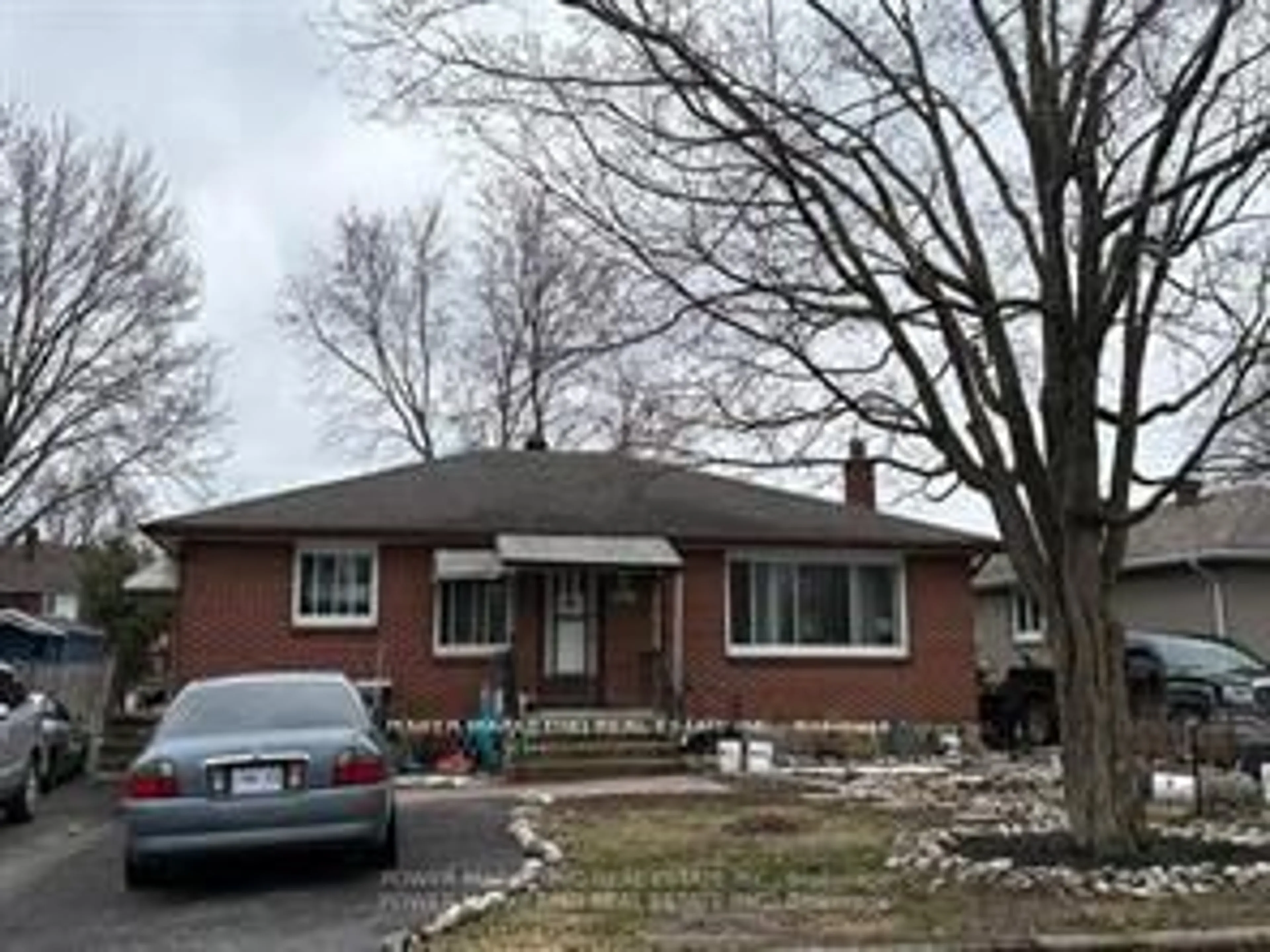 Home with brick exterior material, street for 320 Fullerton Ave, Ottawa Ontario K1K 1K3