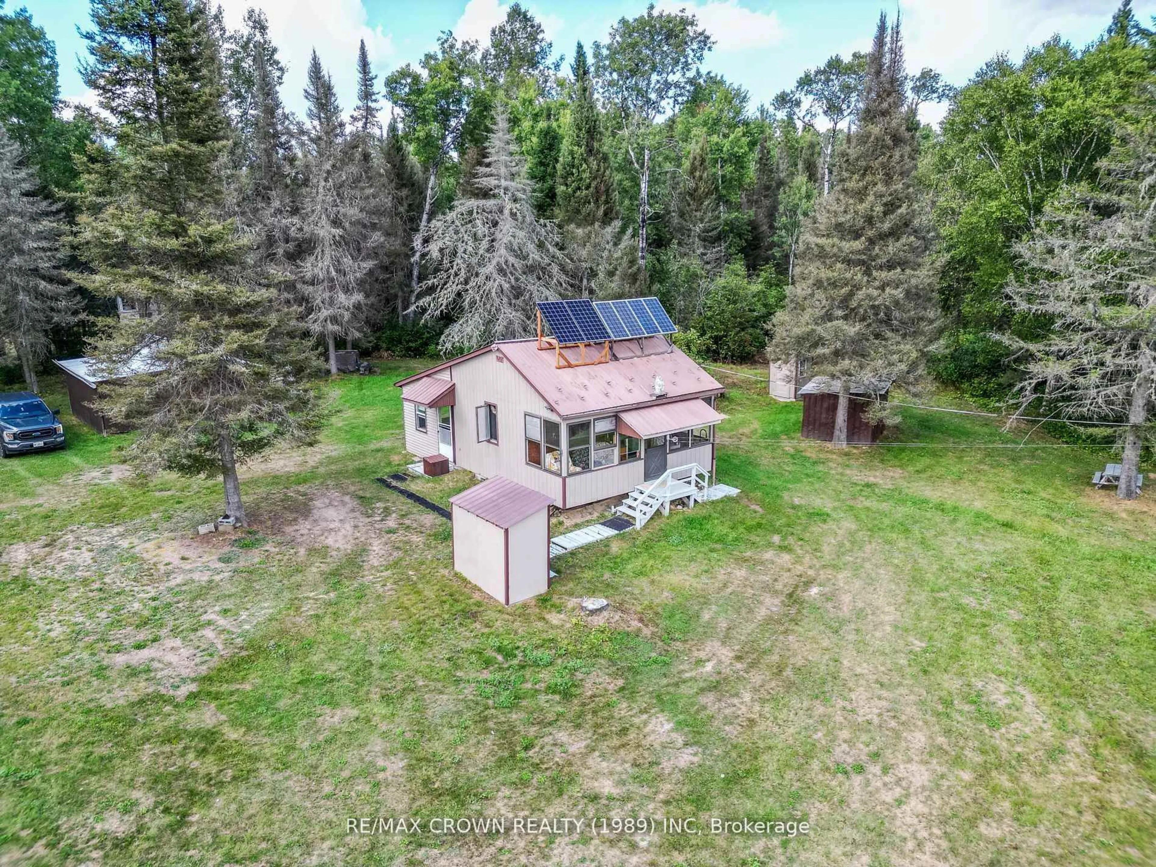 A pic from outside/outdoor area/front of a property/back of a property/a pic from drone, unknown for 346 Cameron Rd, Papineau-Cameron Ontario P0H 1V0