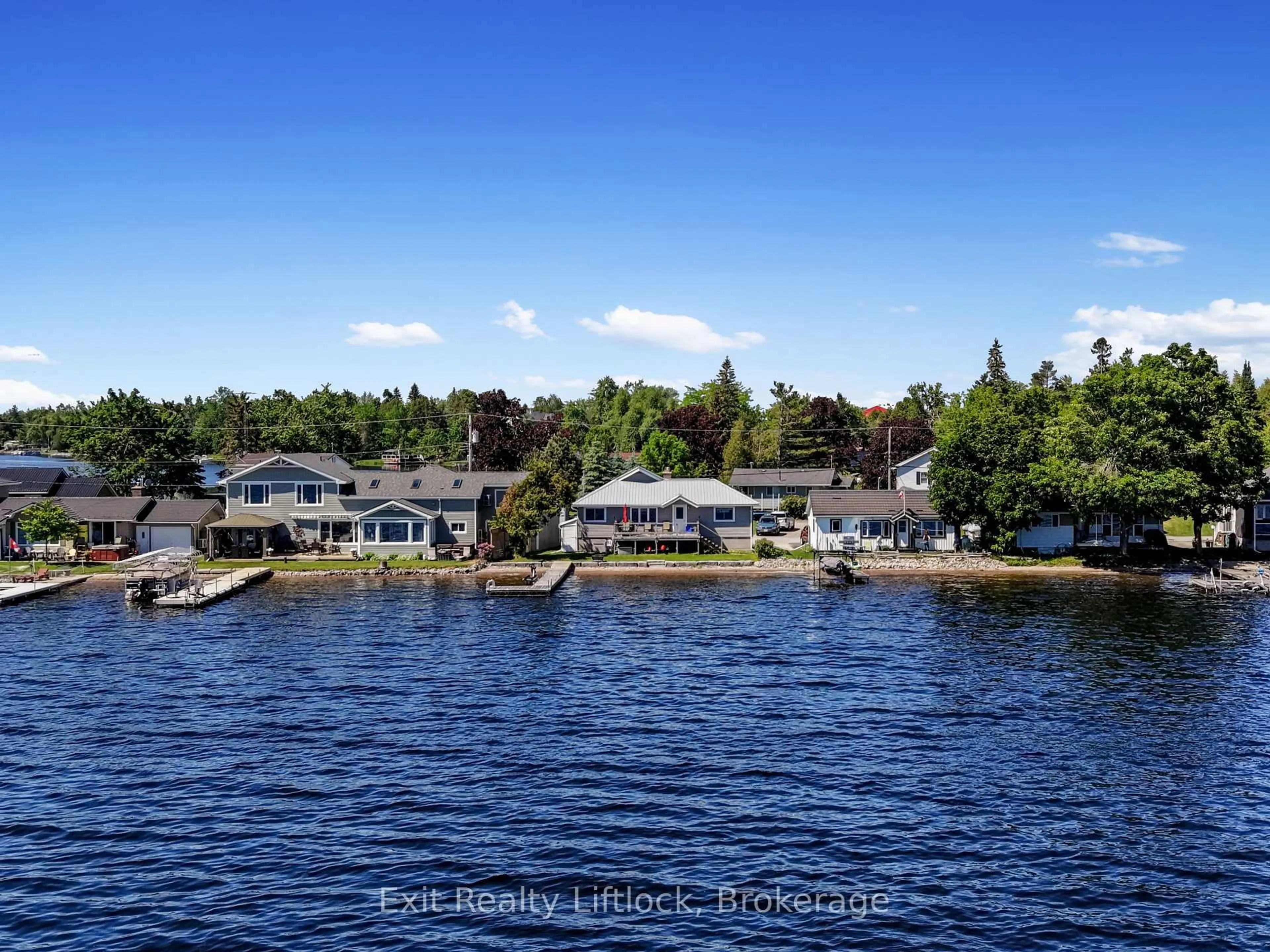 A pic from outside/outdoor area/front of a property/back of a property/a pic from drone, water/lake/river/ocean view for 23 Manor Rd, Kawartha Lakes Ontario K0M 1G0