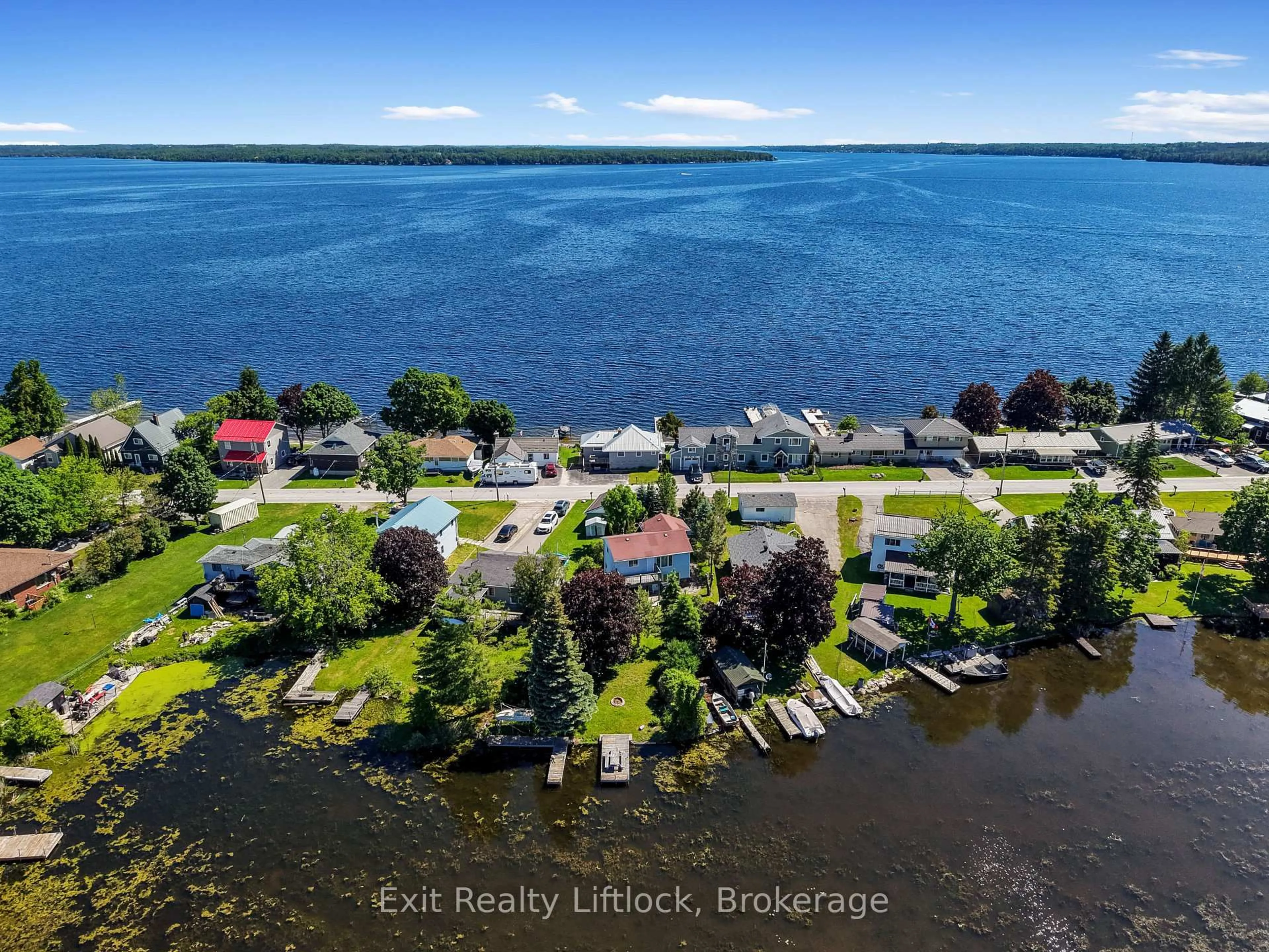 A pic from outside/outdoor area/front of a property/back of a property/a pic from drone, water/lake/river/ocean view for 23 Manor Rd, Kawartha Lakes Ontario K0M 1G0