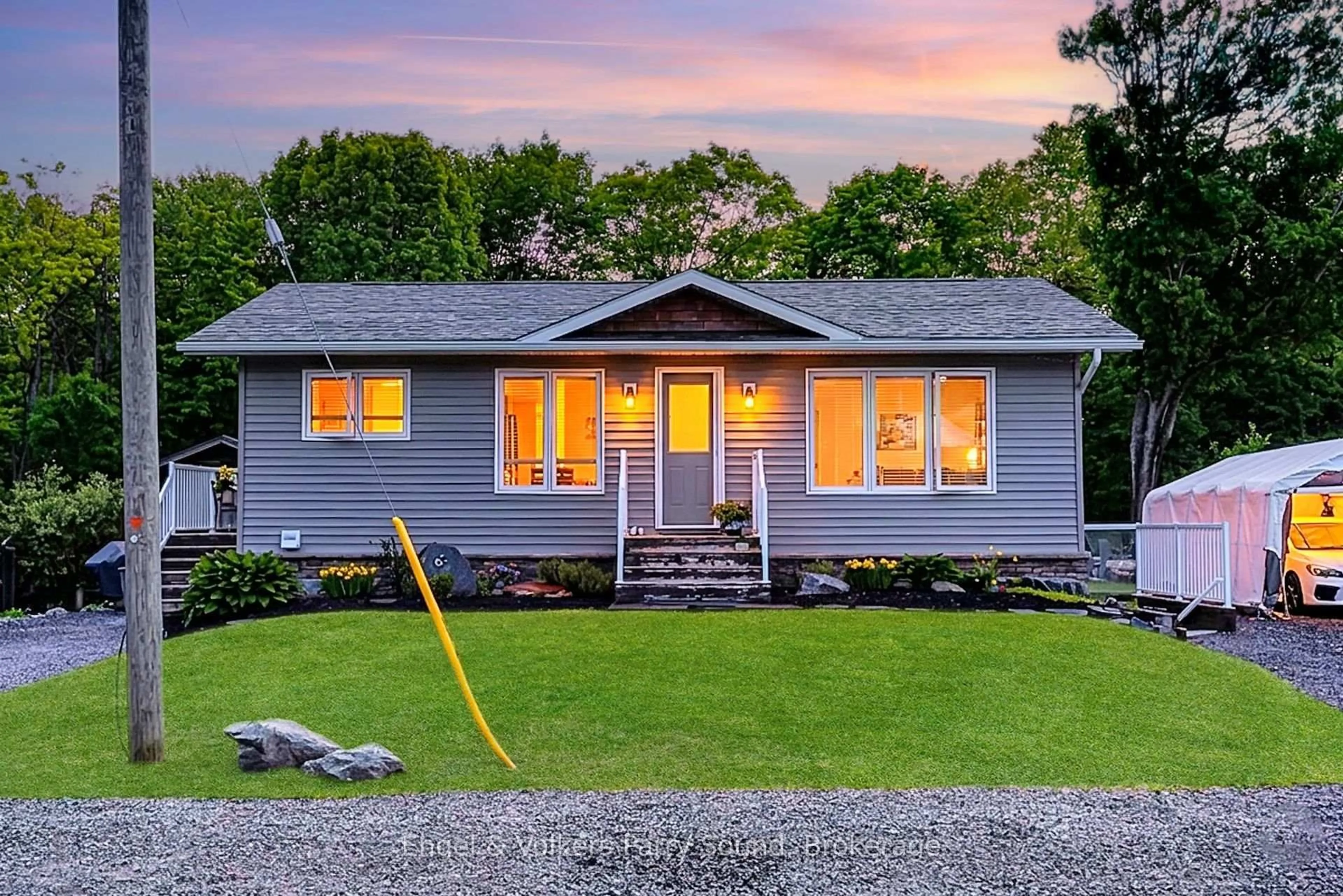 Home with vinyl exterior material, street for 6 Lawrence St, Parry Sound Ontario P2A 2E2