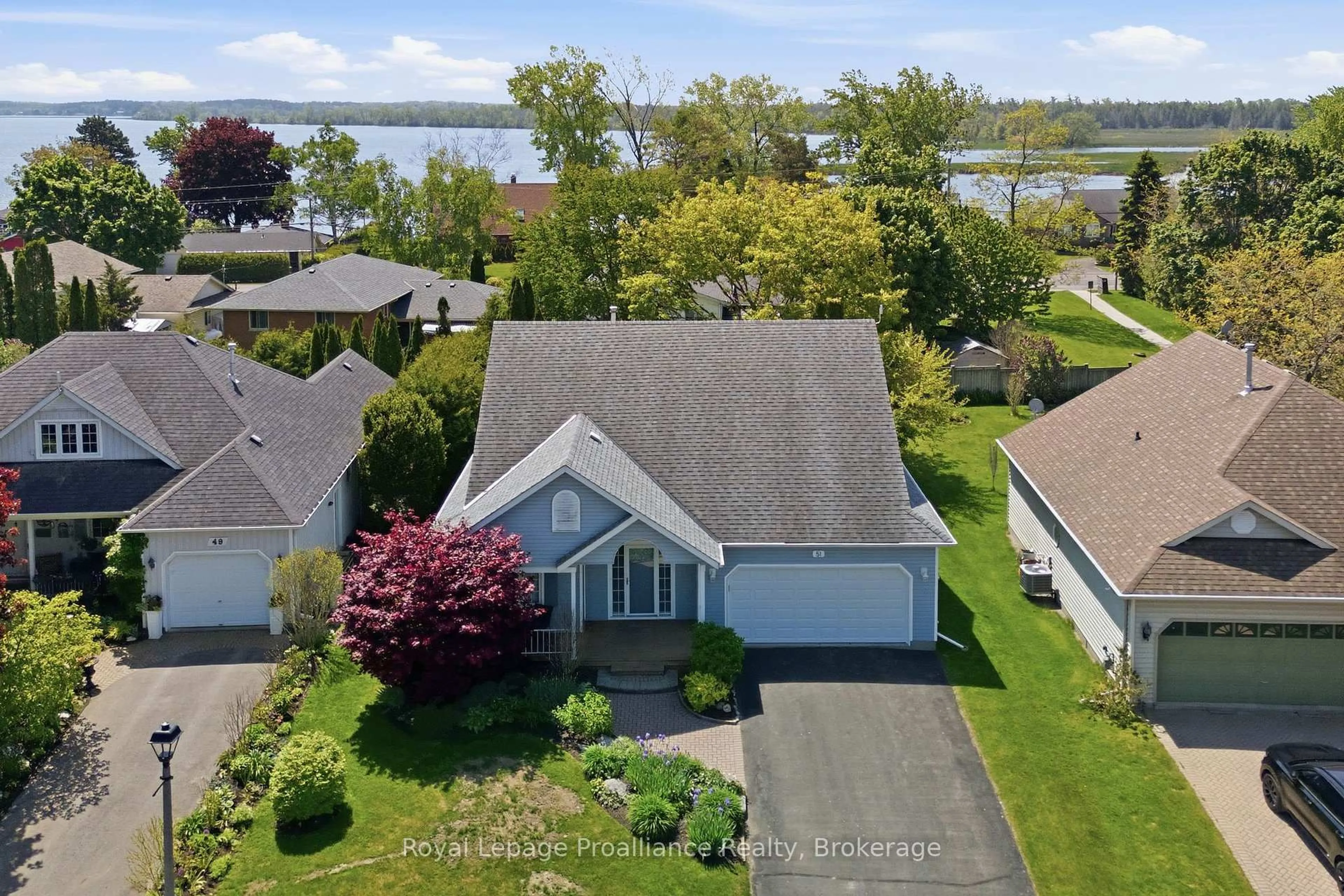 A pic from outside/outdoor area/front of a property/back of a property/a pic from drone, water/lake/river/ocean view for 51 Mills Rd, Brighton Ontario K0K 1H0