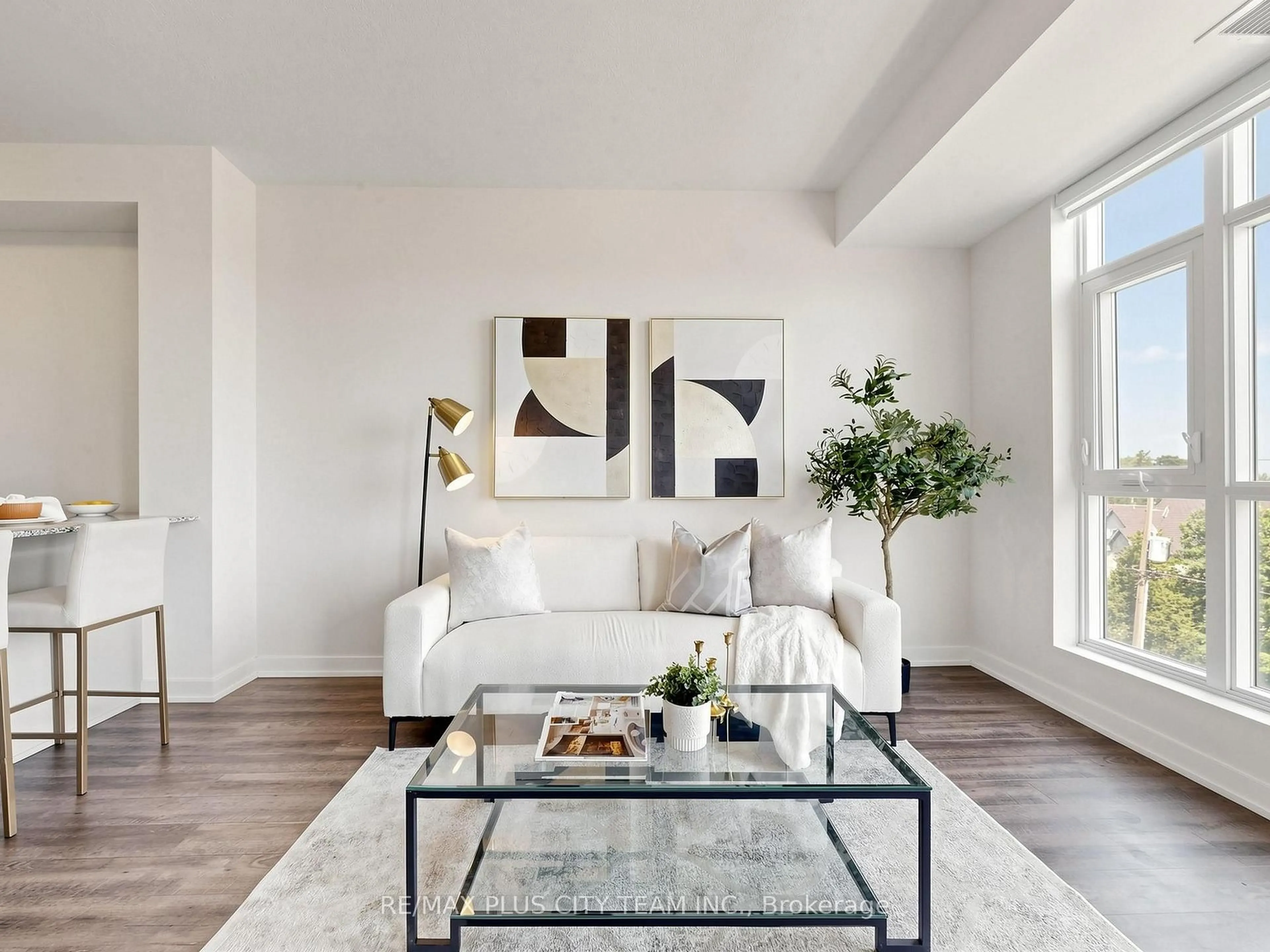 Living room with furniture, unknown for 600 North Service Rd #415, Hamilton Ontario L8E 0L2