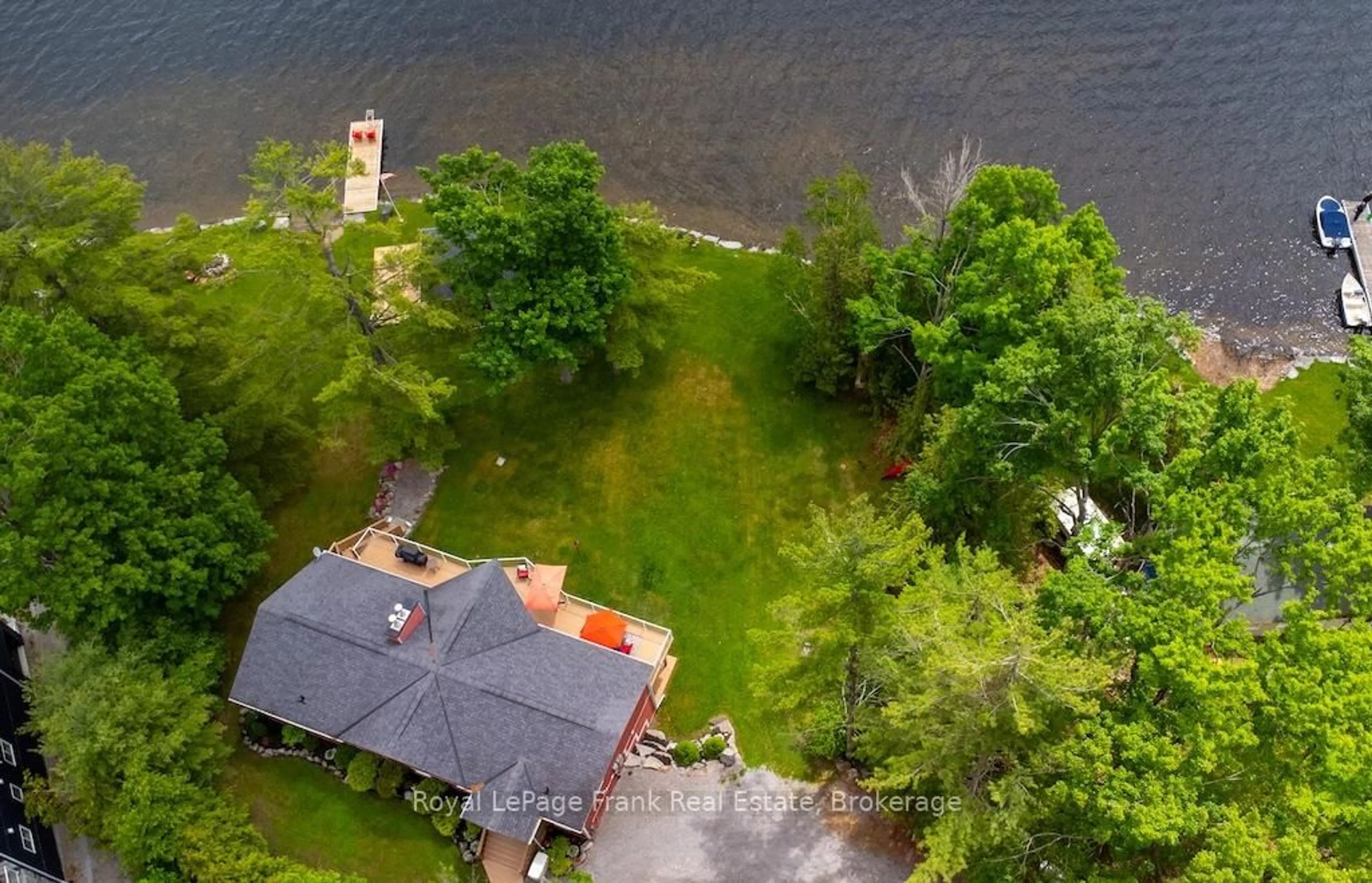 A pic from outside/outdoor area/front of a property/back of a property/a pic from drone, water/lake/river/ocean view for 113 Fire Route 37, Trent Lakes Ontario K0L 1J0