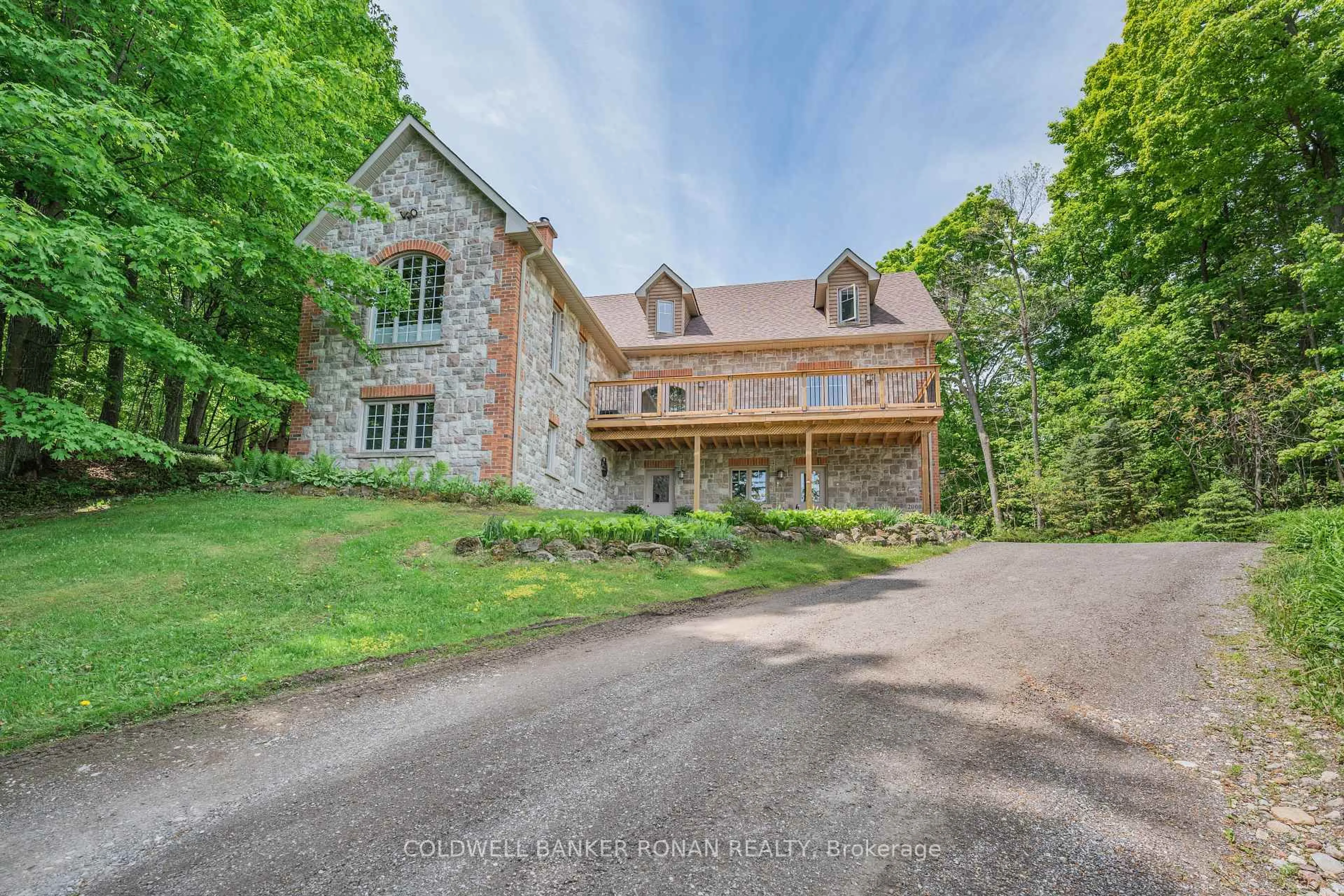 A pic from outside/outdoor area/front of a property/back of a property/a pic from drone, street for 38 Big Tree Circ, Mulmur Ontario L0M 1M0