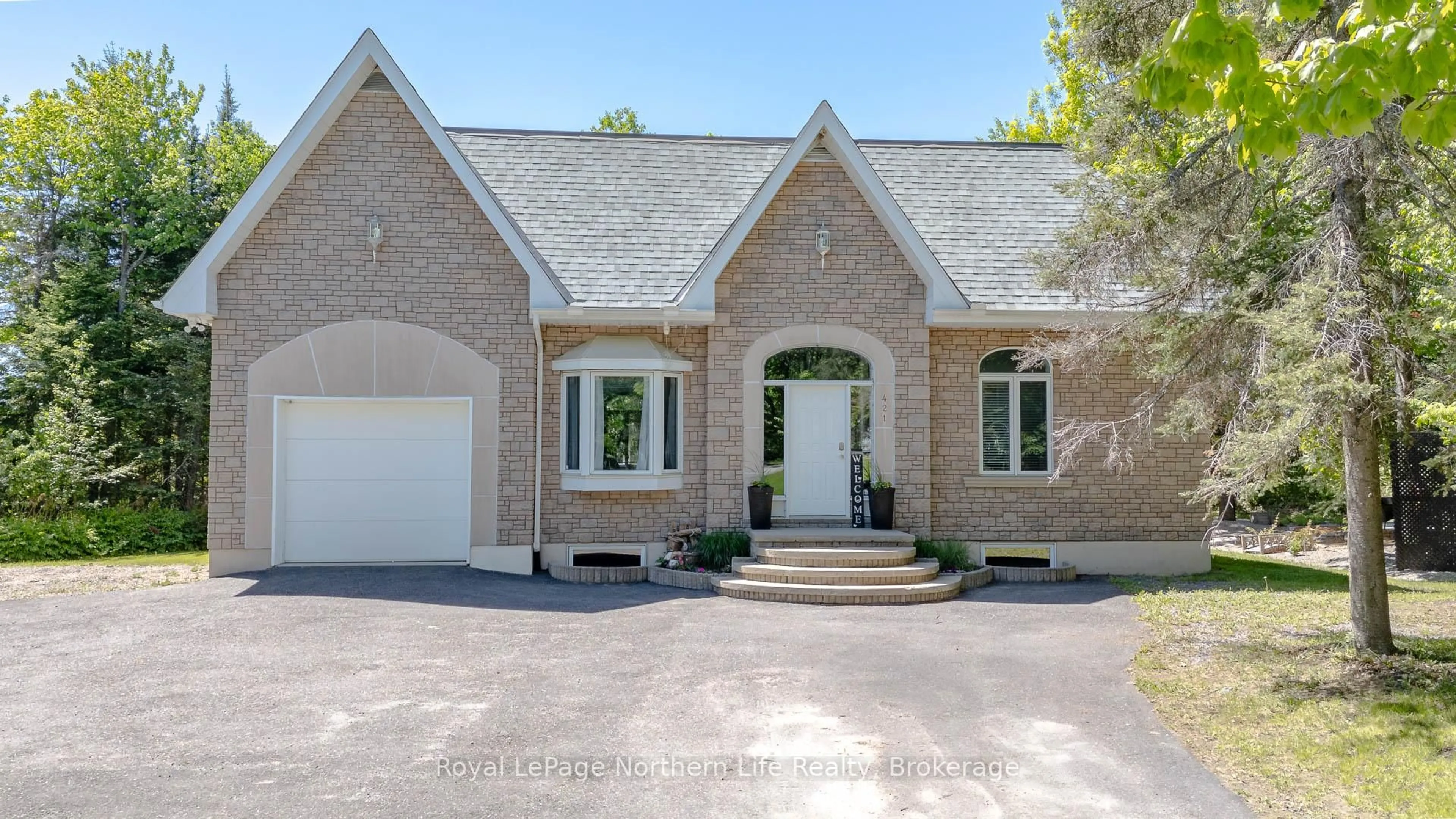 Home with brick exterior material, street for 421 Collins Dr, North Bay Ontario P1B 8G3