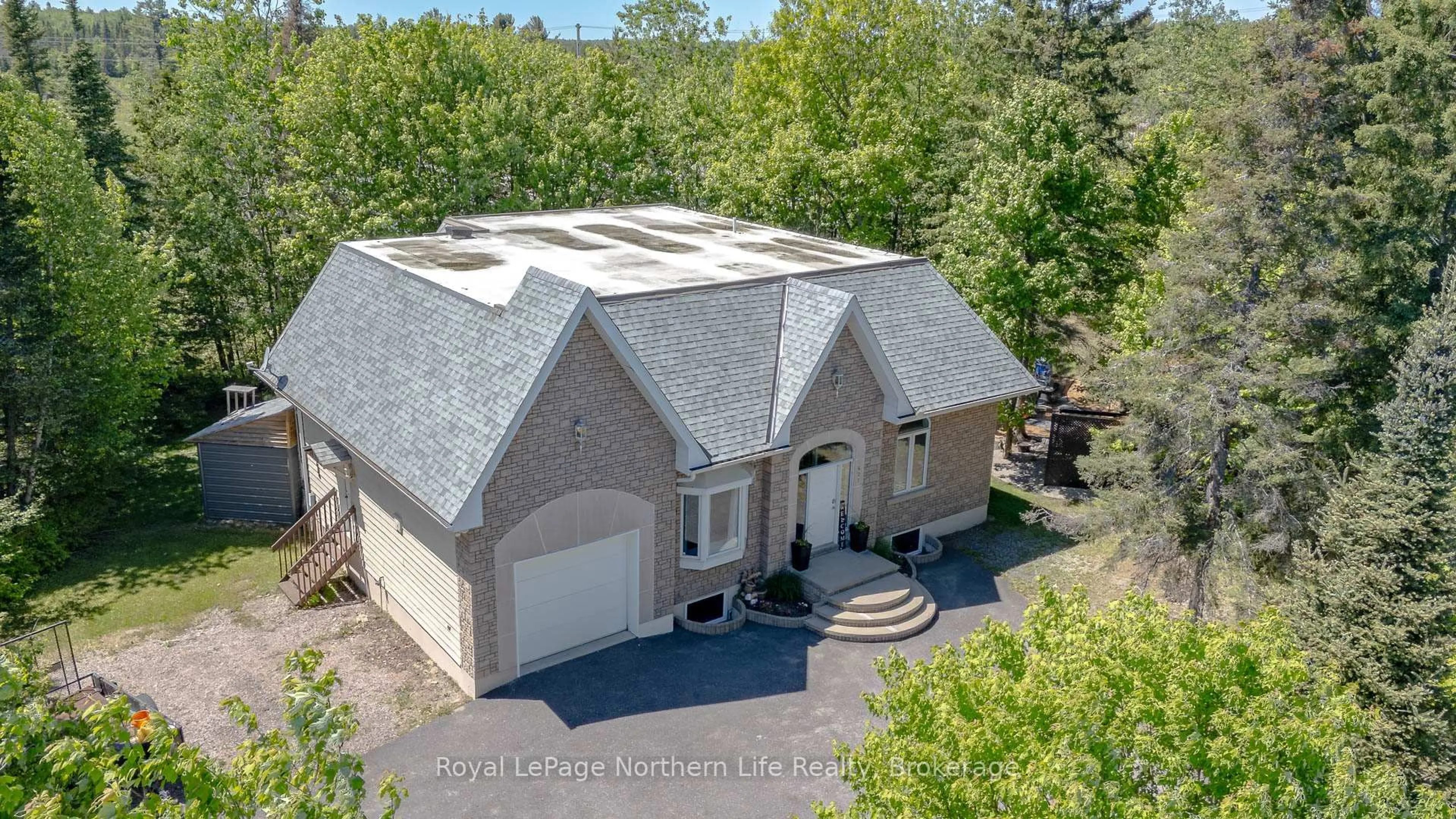 A pic from outside/outdoor area/front of a property/back of a property/a pic from drone, unknown for 421 Collins Dr, North Bay Ontario P1B 8G3