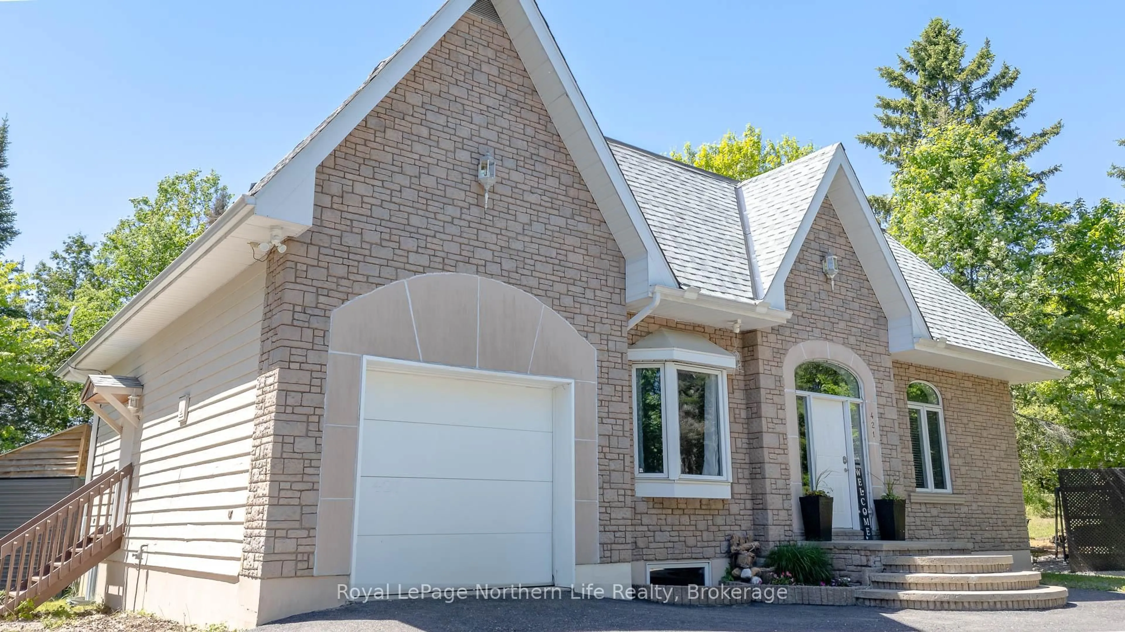 Home with brick exterior material, street for 421 Collins Dr, North Bay Ontario P1B 8G3