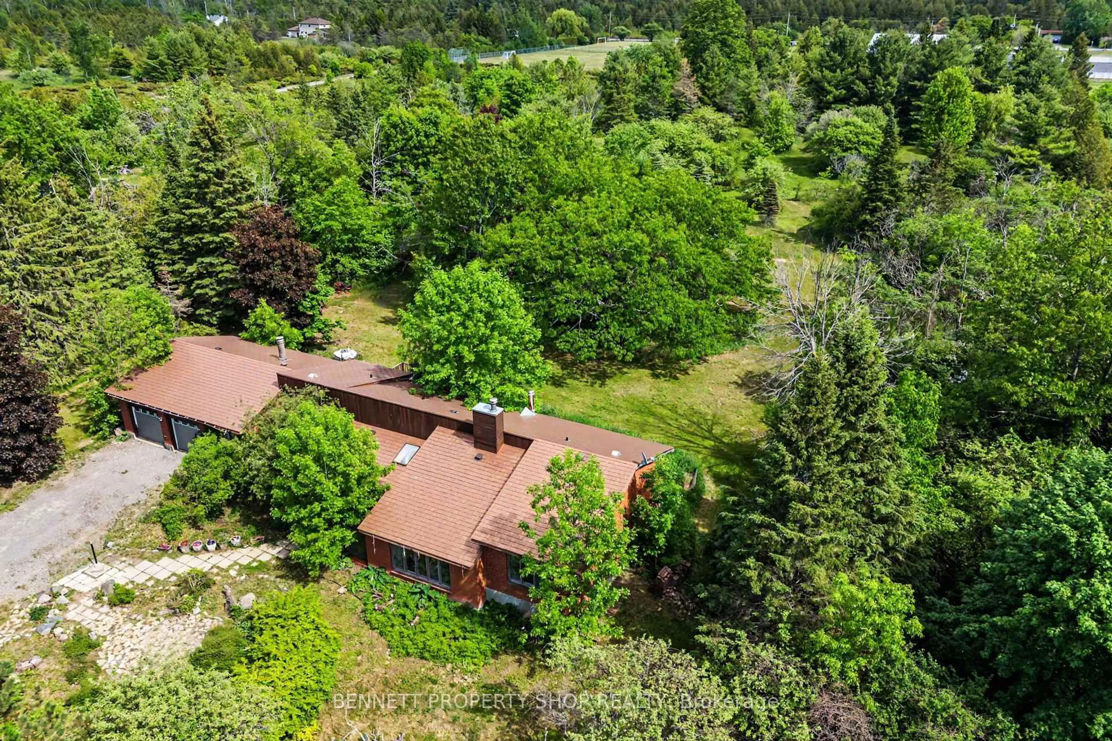 A pic from outside/outdoor area/front of a property/back of a property/a pic from drone, forest/trees view for 110 Manion Rd, Carp Ontario K0A 1L0