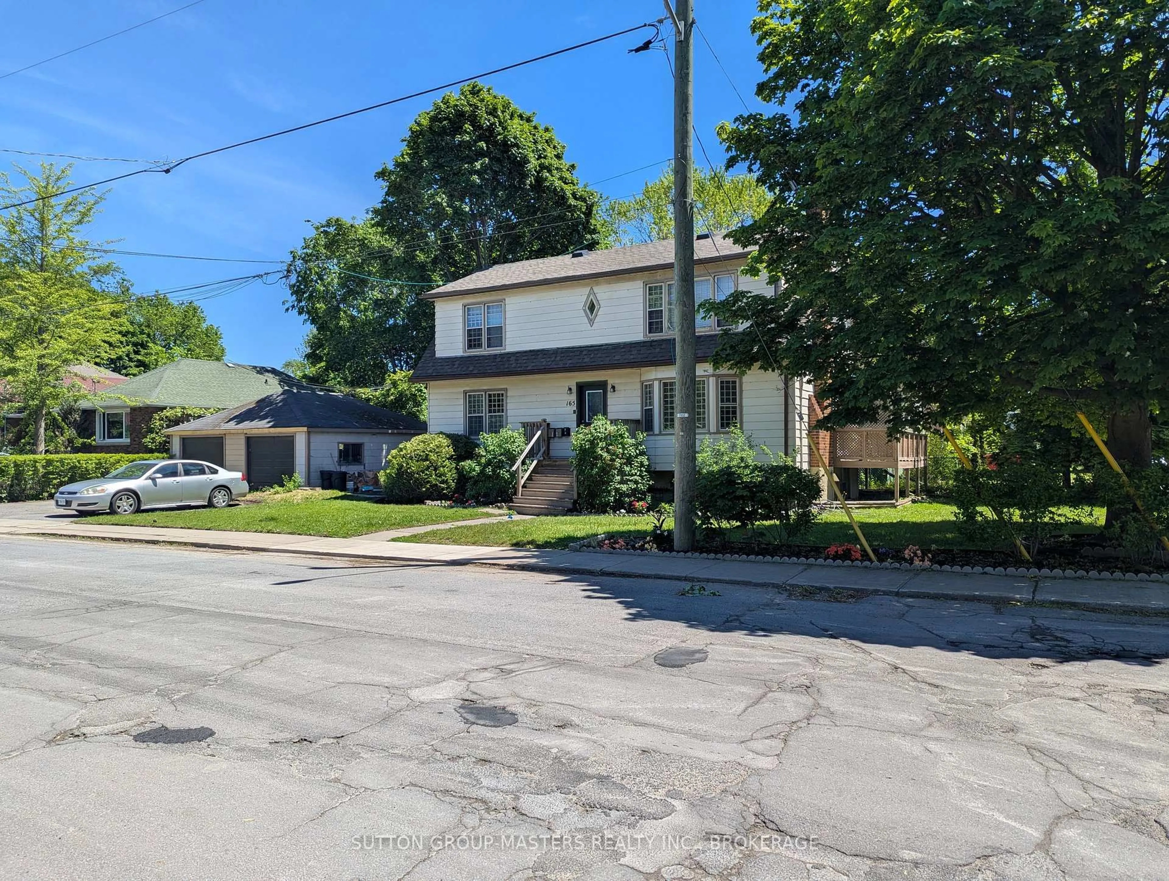 A pic from outside/outdoor area/front of a property/back of a property/a pic from drone, street for 165 Helen St, Kingston Ontario K7L 4P5