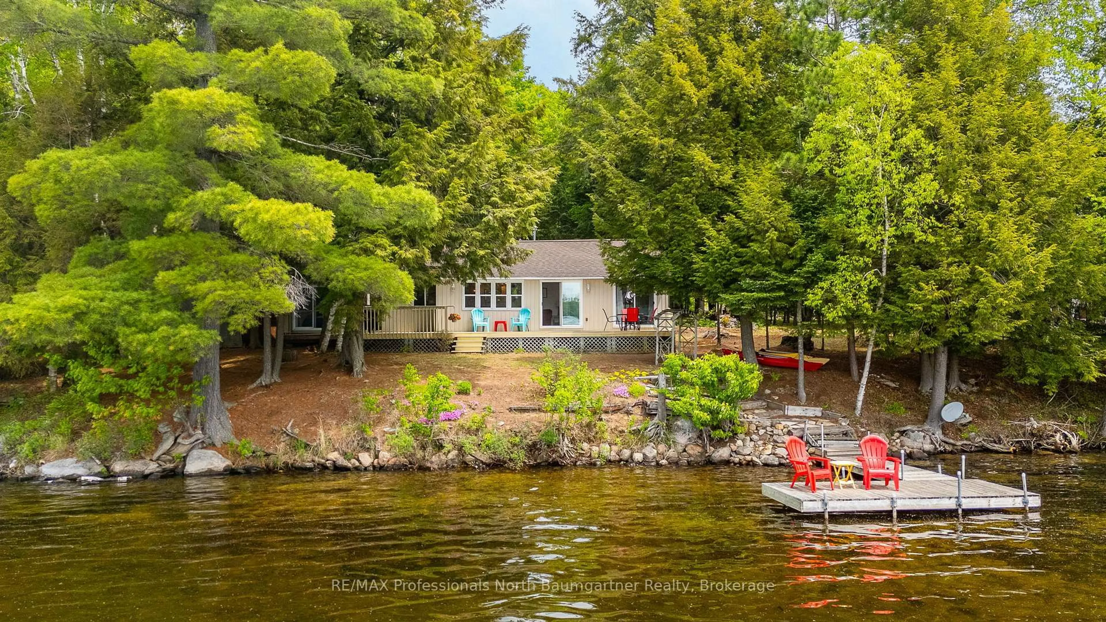 A pic from outside/outdoor area/front of a property/back of a property/a pic from drone, water/lake/river/ocean view for 1053 Porter Rd, Dysart et al Ontario K0M 1S0