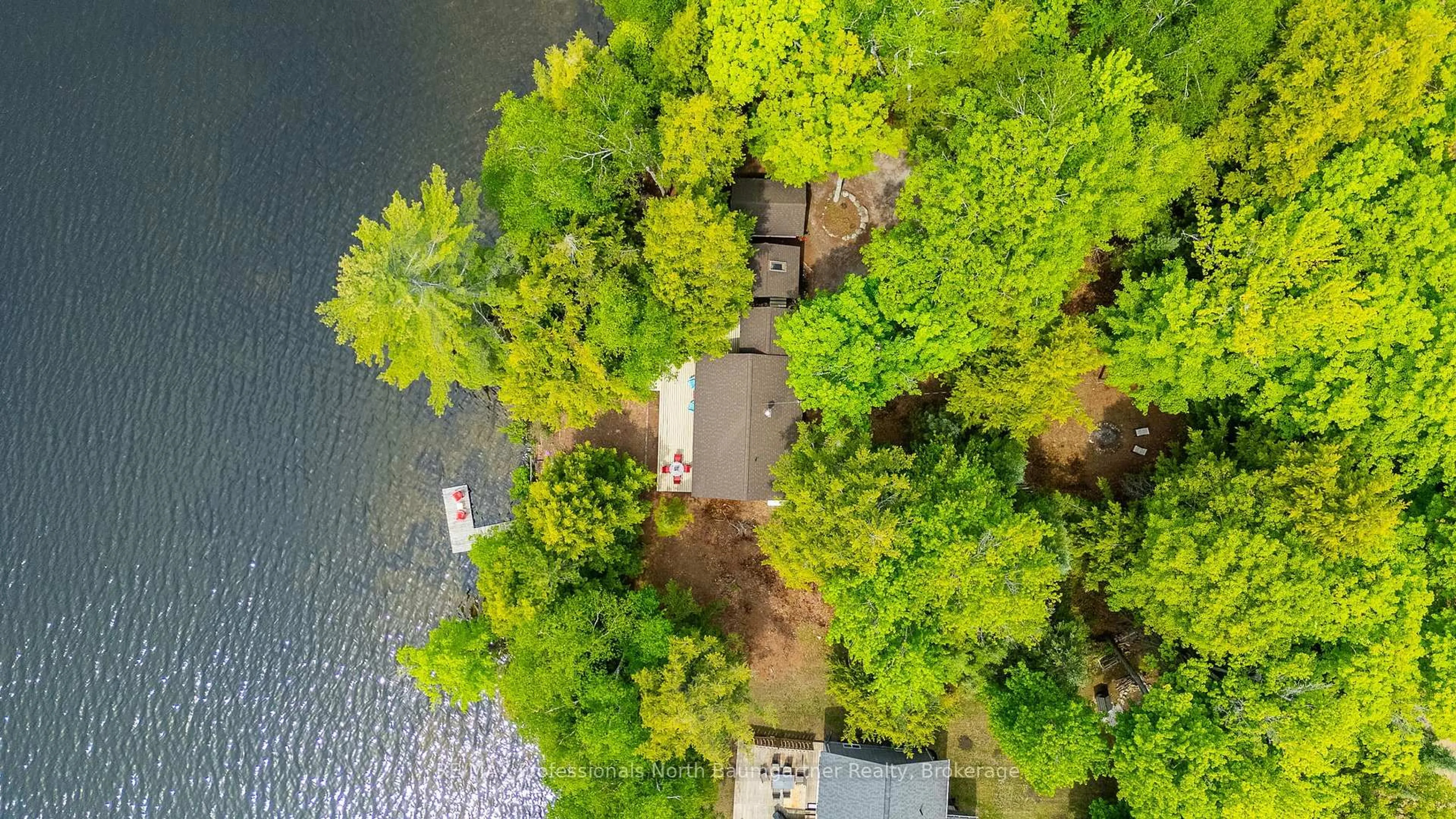 A pic from outside/outdoor area/front of a property/back of a property/a pic from drone, water/lake/river/ocean view for 1053 Porter Rd, Dysart et al Ontario K0M 1S0