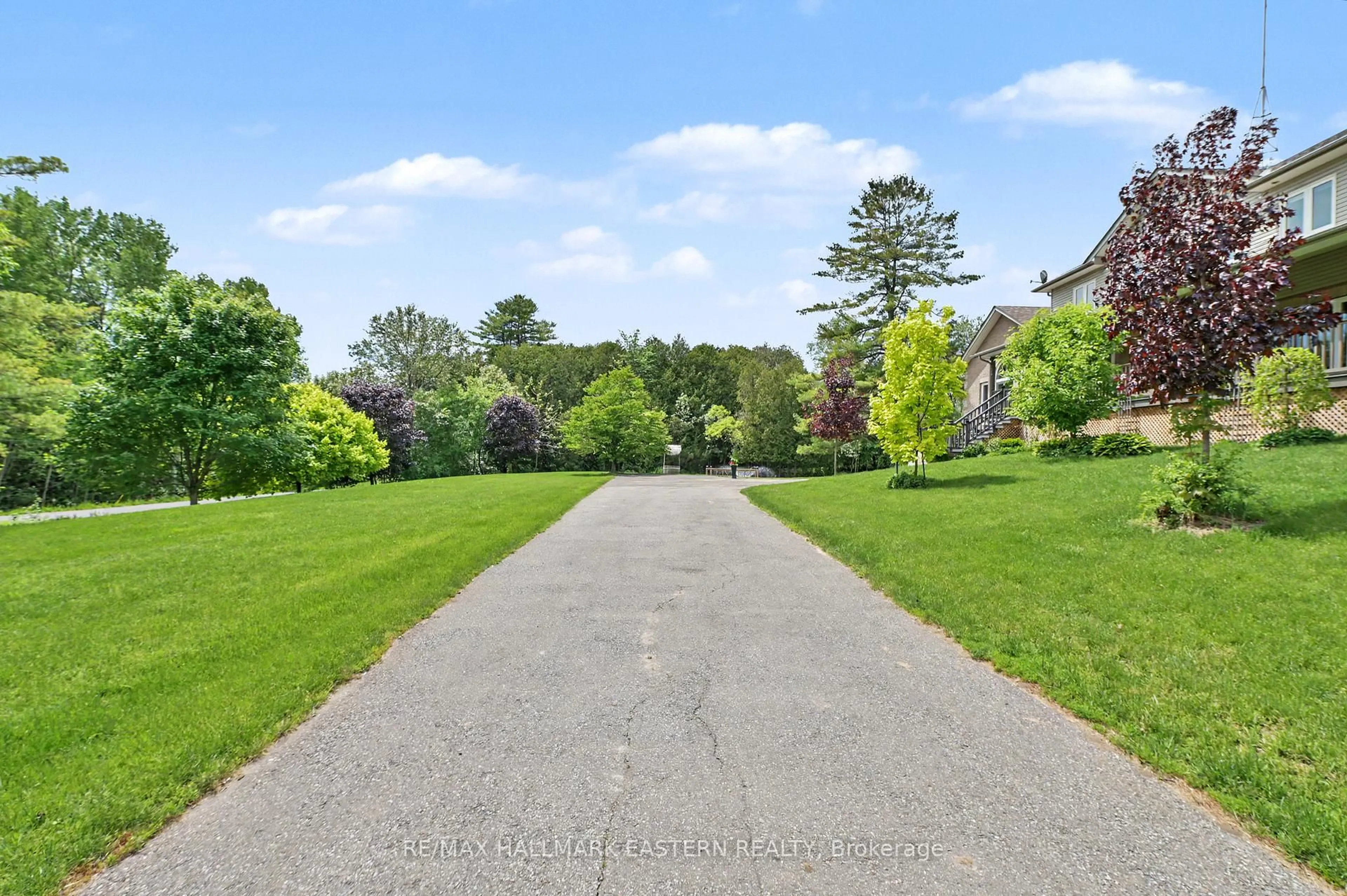 A pic from outside/outdoor area/front of a property/back of a property/a pic from drone, street for 4038 Spring Rd, Hamilton Township Ontario L1A 3V6