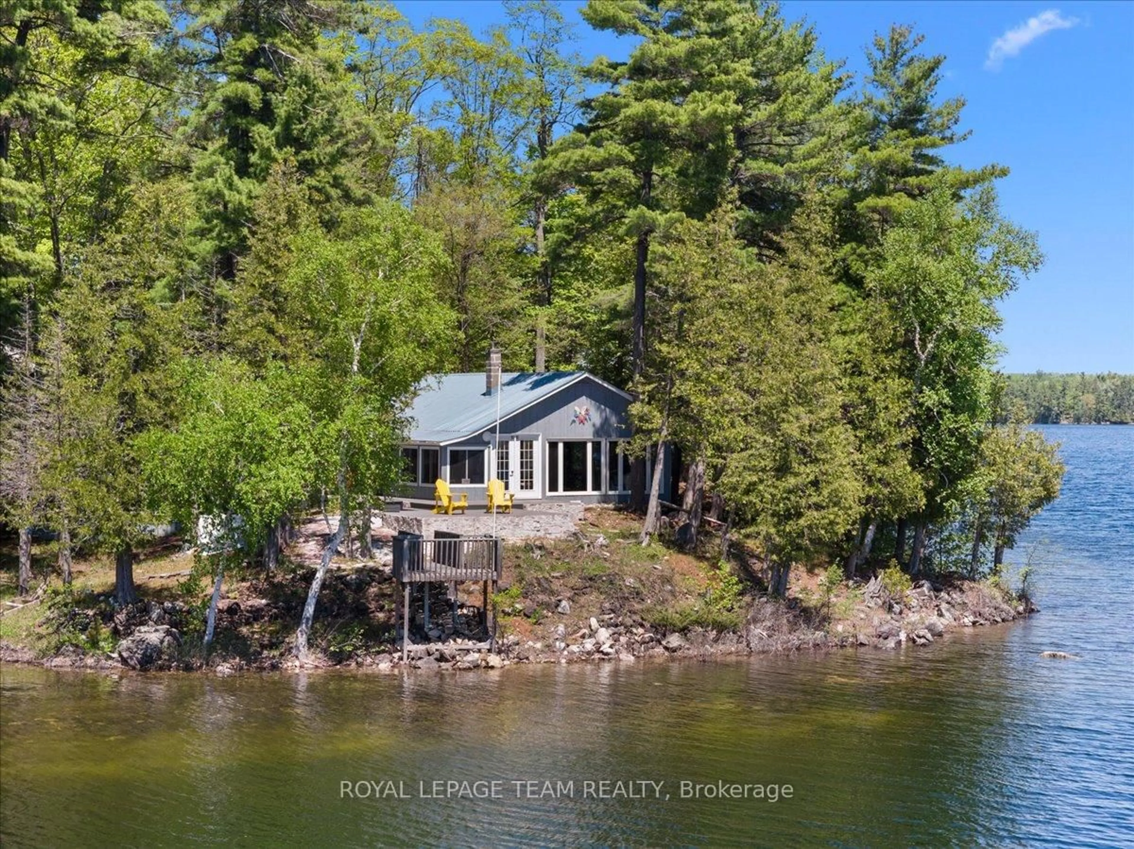 A pic from outside/outdoor area/front of a property/back of a property/a pic from drone, water/lake/river/ocean view for 91 Bertrim Lane, Tichborne Ontario K0H 2V0