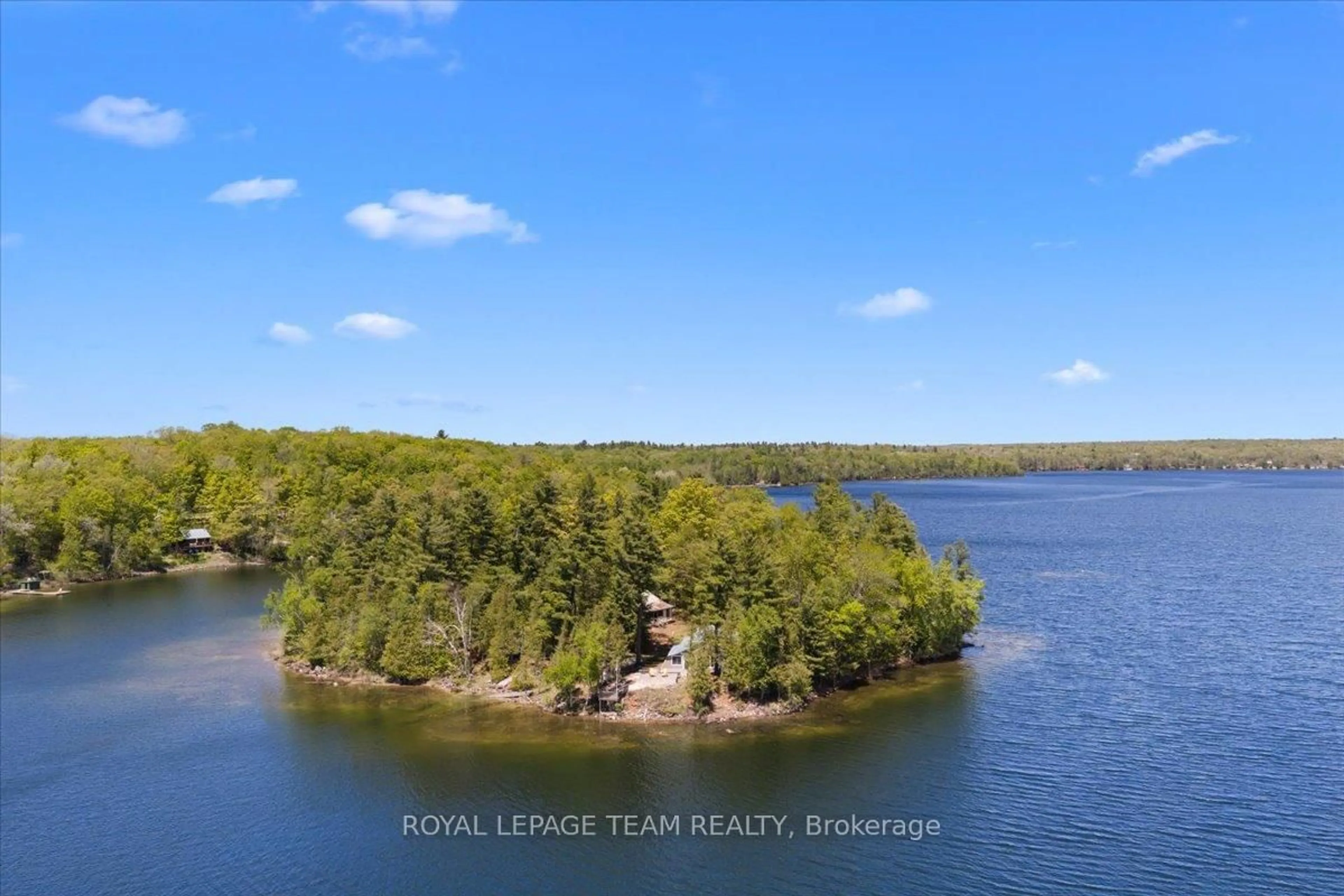 A pic from outside/outdoor area/front of a property/back of a property/a pic from drone, water/lake/river/ocean view for 91 Bertrim Lane, Tichborne Ontario K0H 2V0