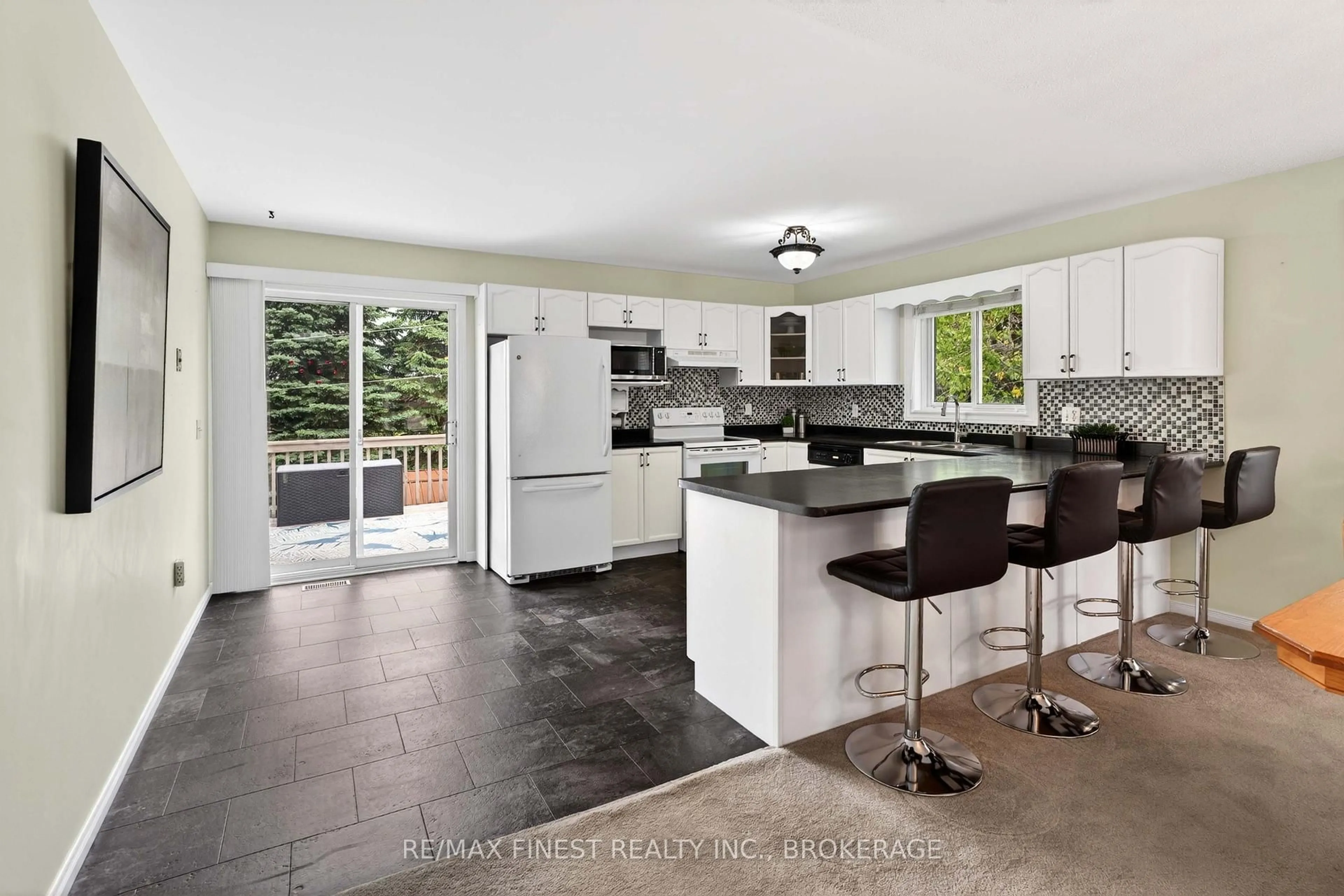 Open concept kitchen, ceramic/tile floor for 52 Johnson St, Prince Edward County Ontario K0K 2T0