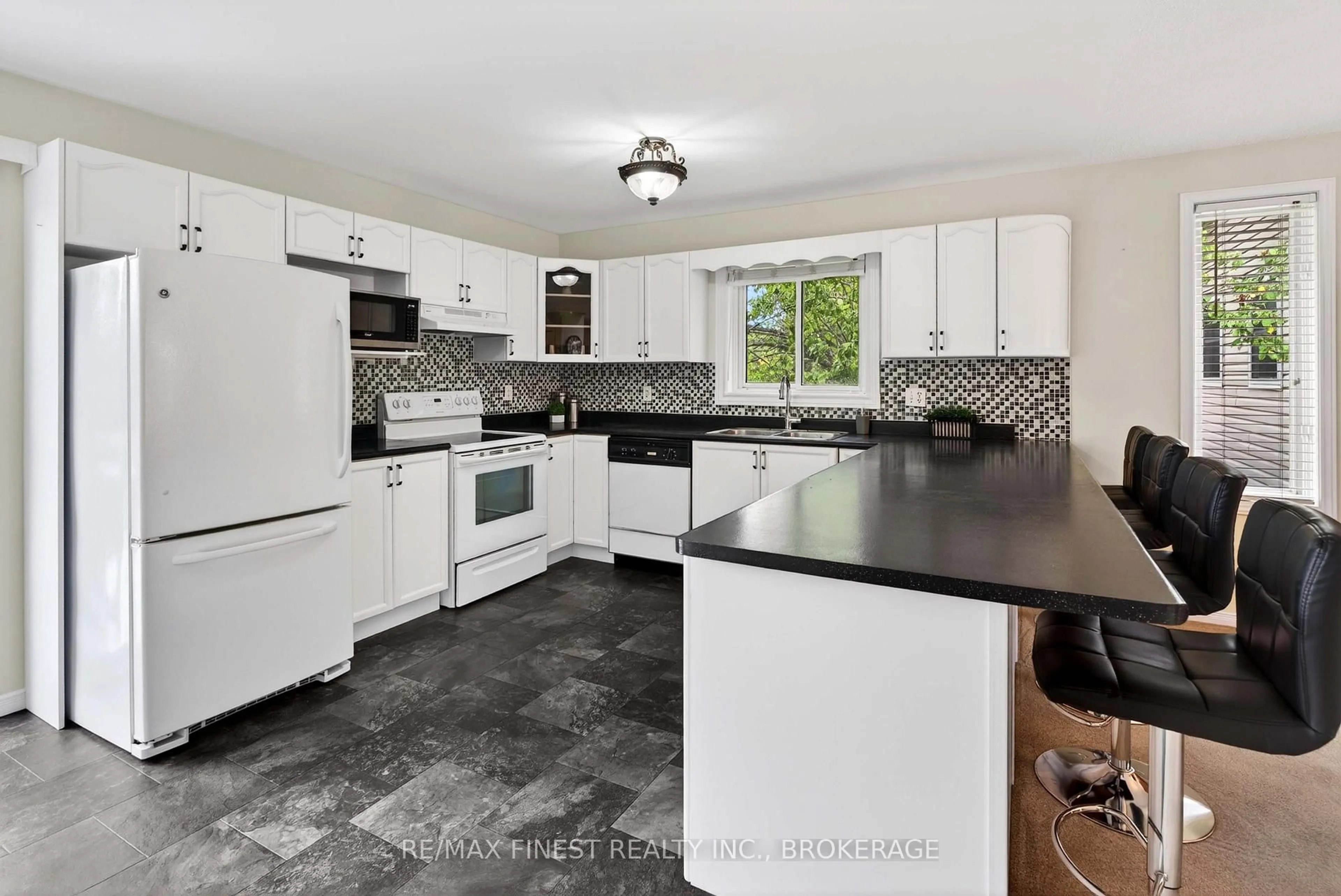 Open concept kitchen, ceramic/tile floor for 52 Johnson St, Prince Edward County Ontario K0K 2T0