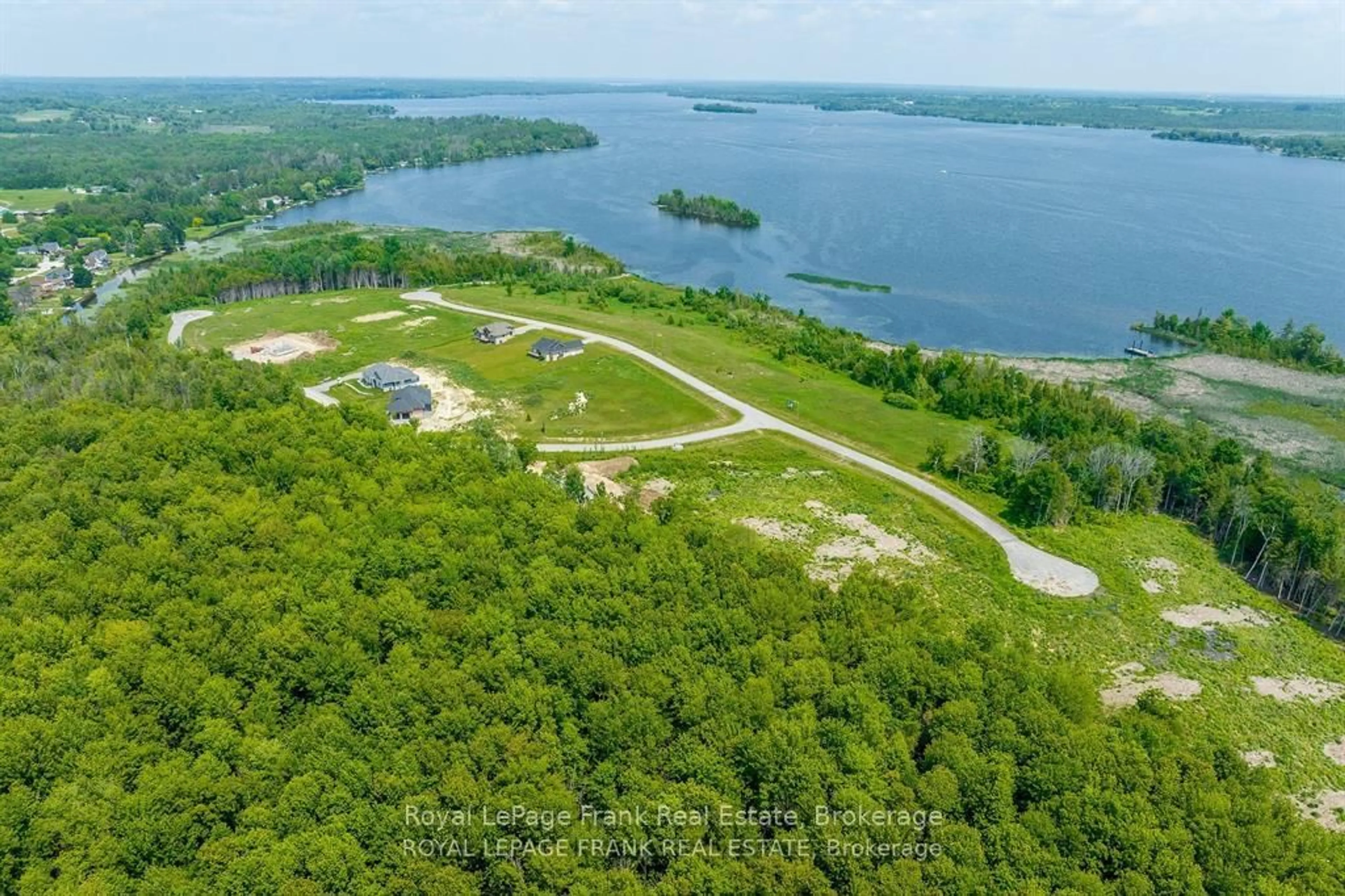 A pic from outside/outdoor area/front of a property/back of a property/a pic from drone, water/lake/river/ocean view for 5 Nipigon St, Kawartha Lakes Ontario K0M 1N0