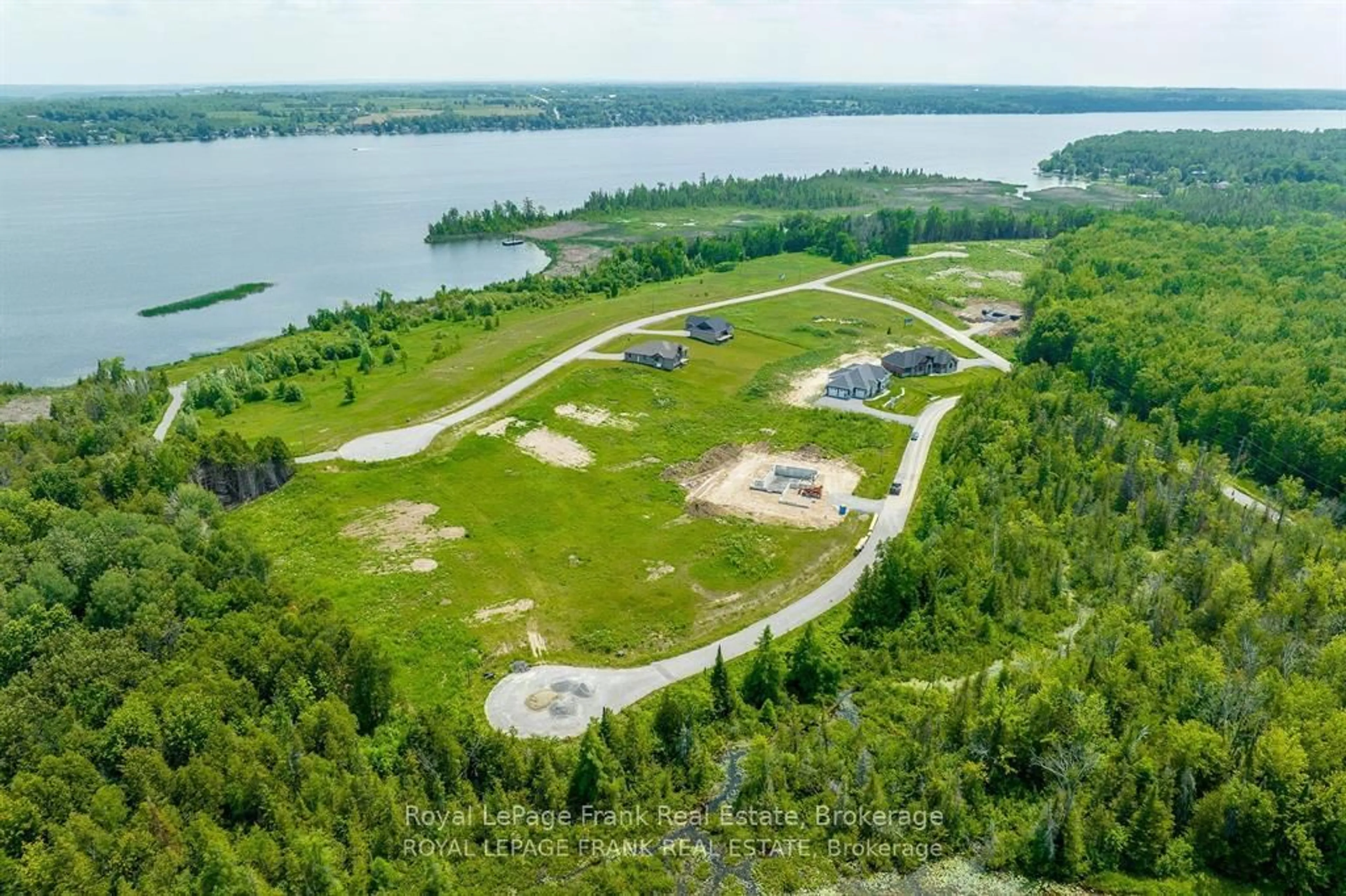 A pic from outside/outdoor area/front of a property/back of a property/a pic from drone, water/lake/river/ocean view for 5 Nipigon St, Kawartha Lakes Ontario K0M 1N0
