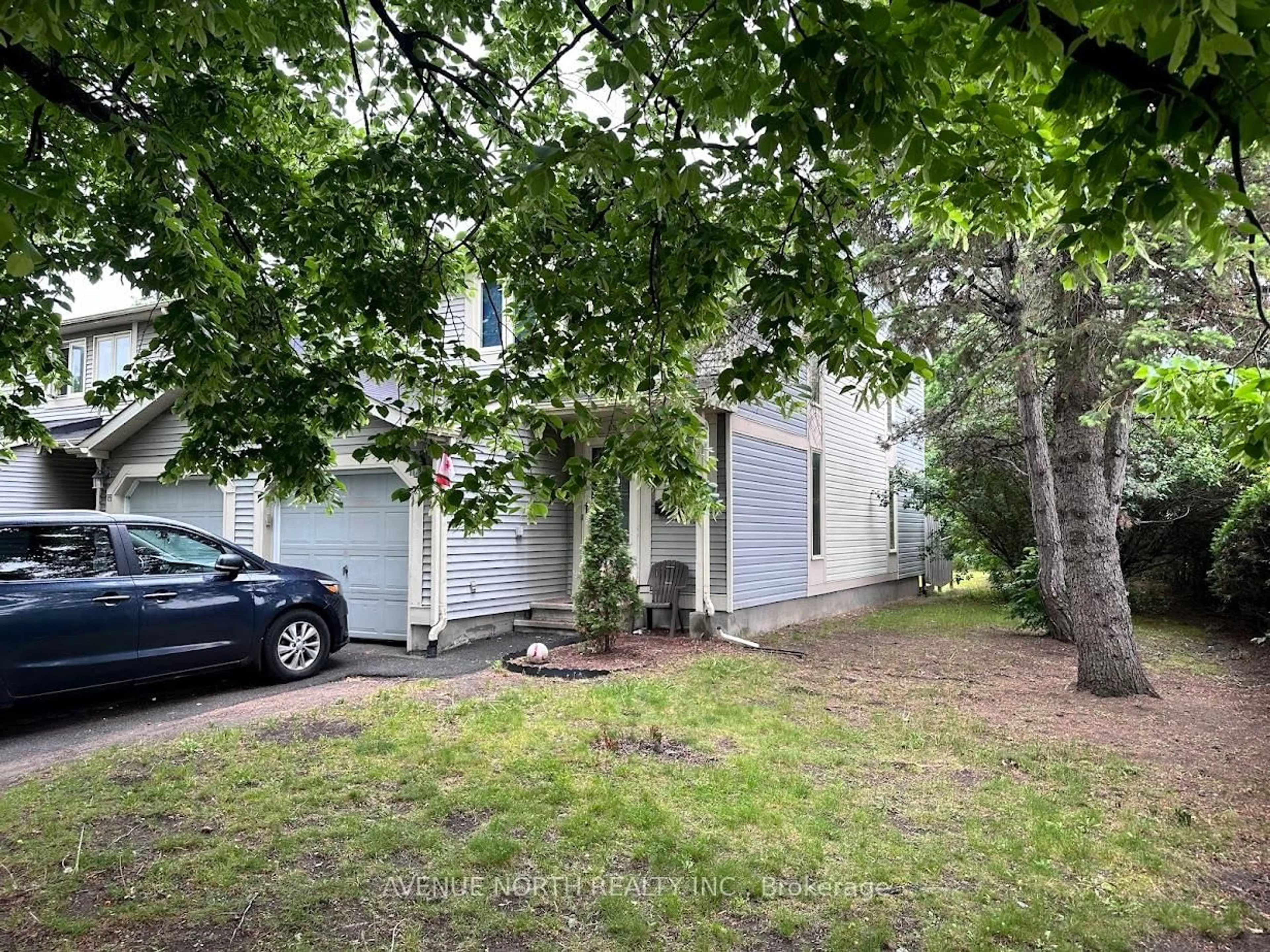 A pic from outside/outdoor area/front of a property/back of a property/a pic from drone, forest/trees view for 85 Birmingham Private #9, Ottawa Ontario K2H 9P2