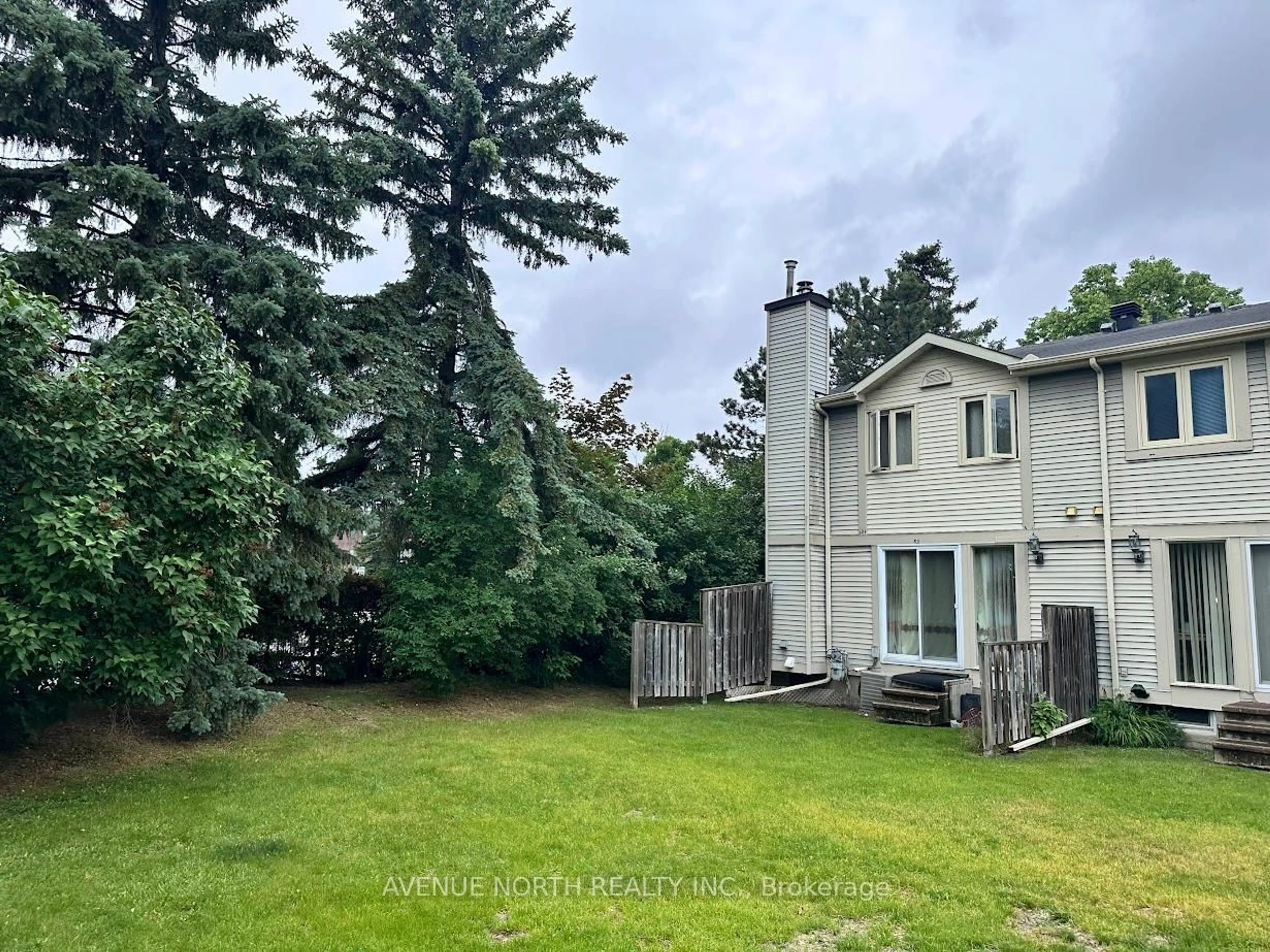 A pic from outside/outdoor area/front of a property/back of a property/a pic from drone, forest/trees view for 85 Birmingham Private #9, Ottawa Ontario K2H 9P2