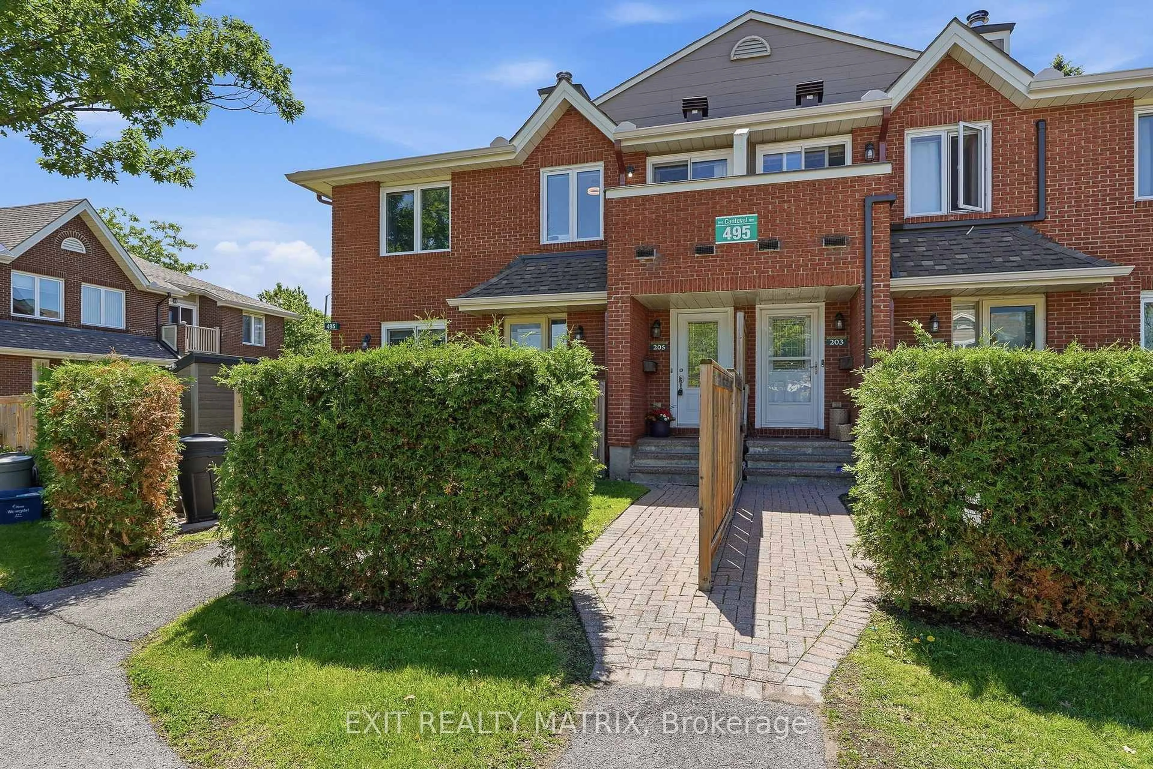 A pic from outside/outdoor area/front of a property/back of a property/a pic from drone, street for 495 Canteval Terr #205, Orleans Ontario K4A 2E1