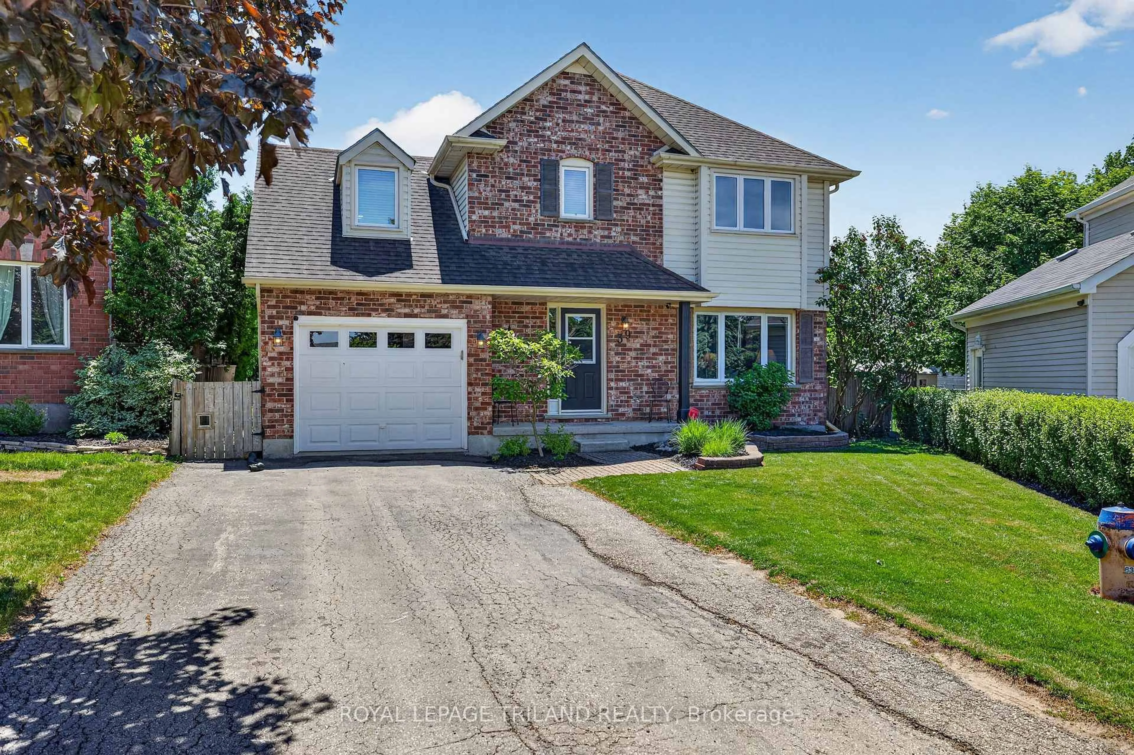 Home with brick exterior material, street for 39 Hitch Cres, St. Thomas Ontario N5R 5X9