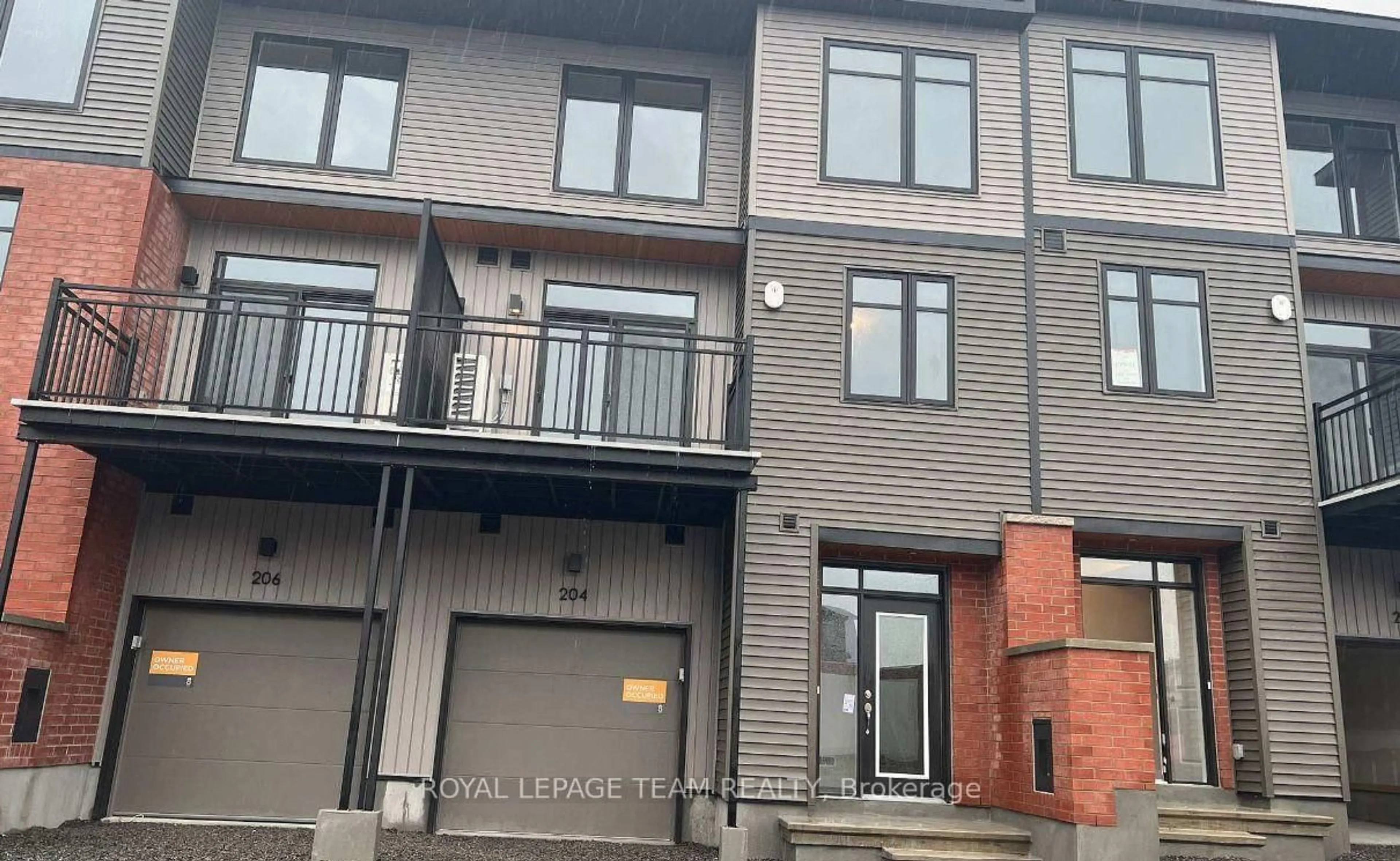 Home with brick exterior material, street for 204 Tussock Private, Ottawa Ontario K1X 0M8