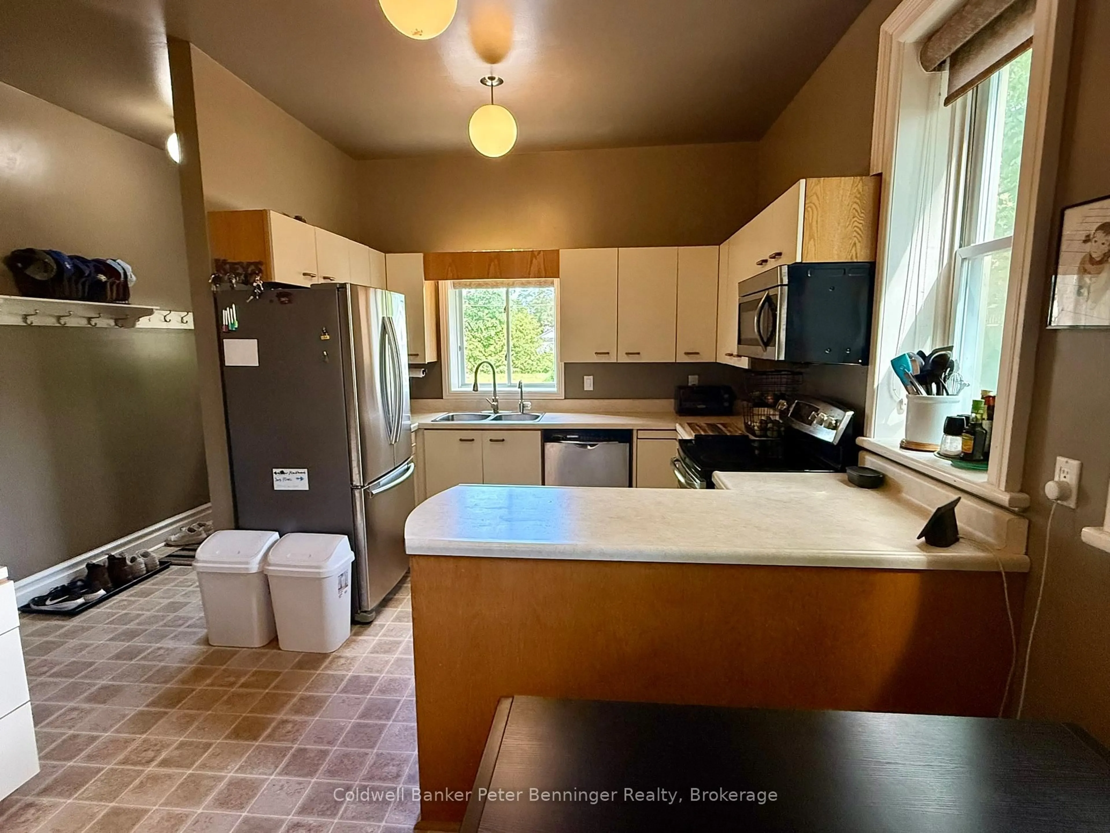 Kitchen with laundary machines, ceramic/tile floor for 612 Colborne St, Brockton Ontario N0G 2V0