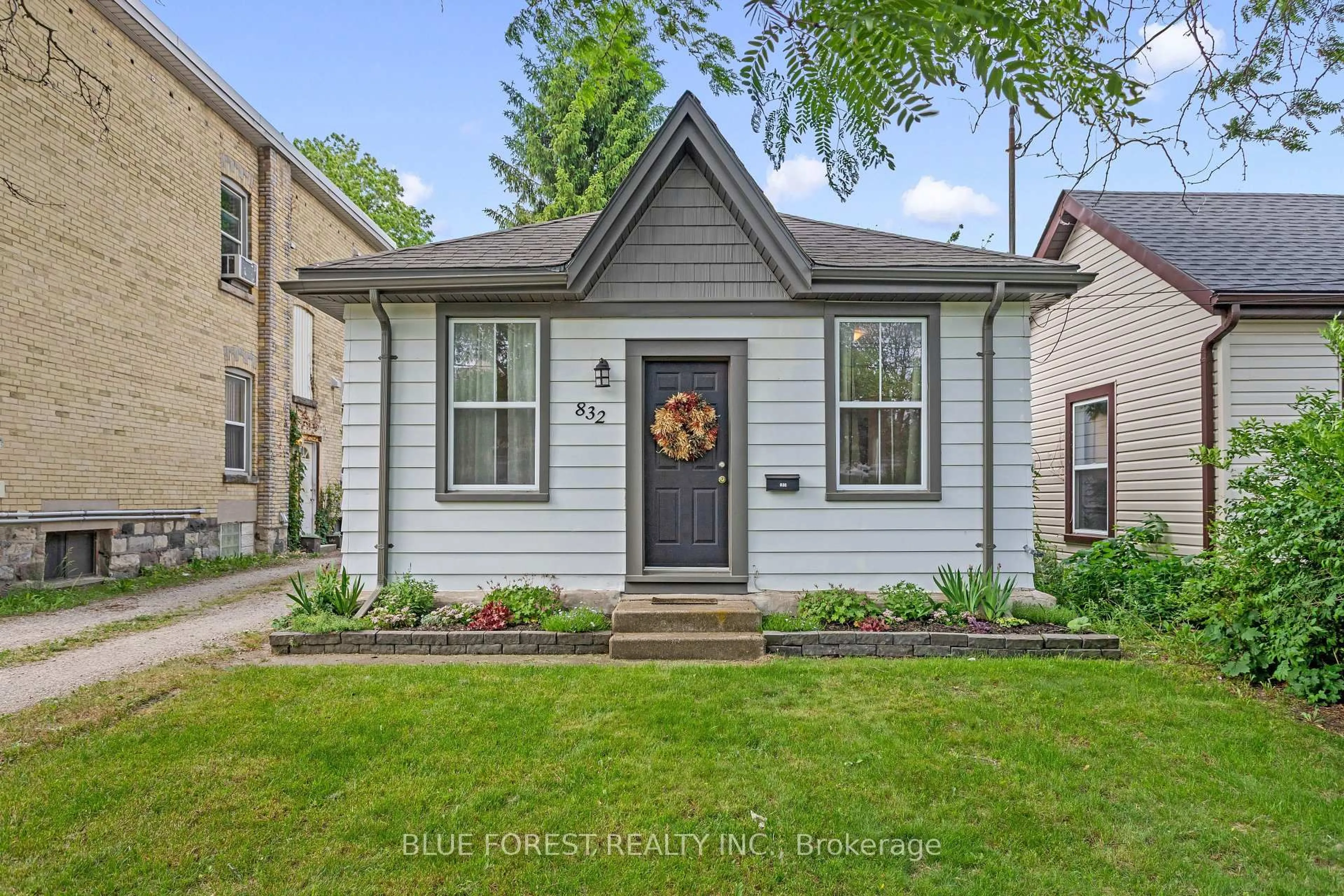 Home with brick exterior material, street for 832 Queens Ave, London East Ontario N5W 3H6