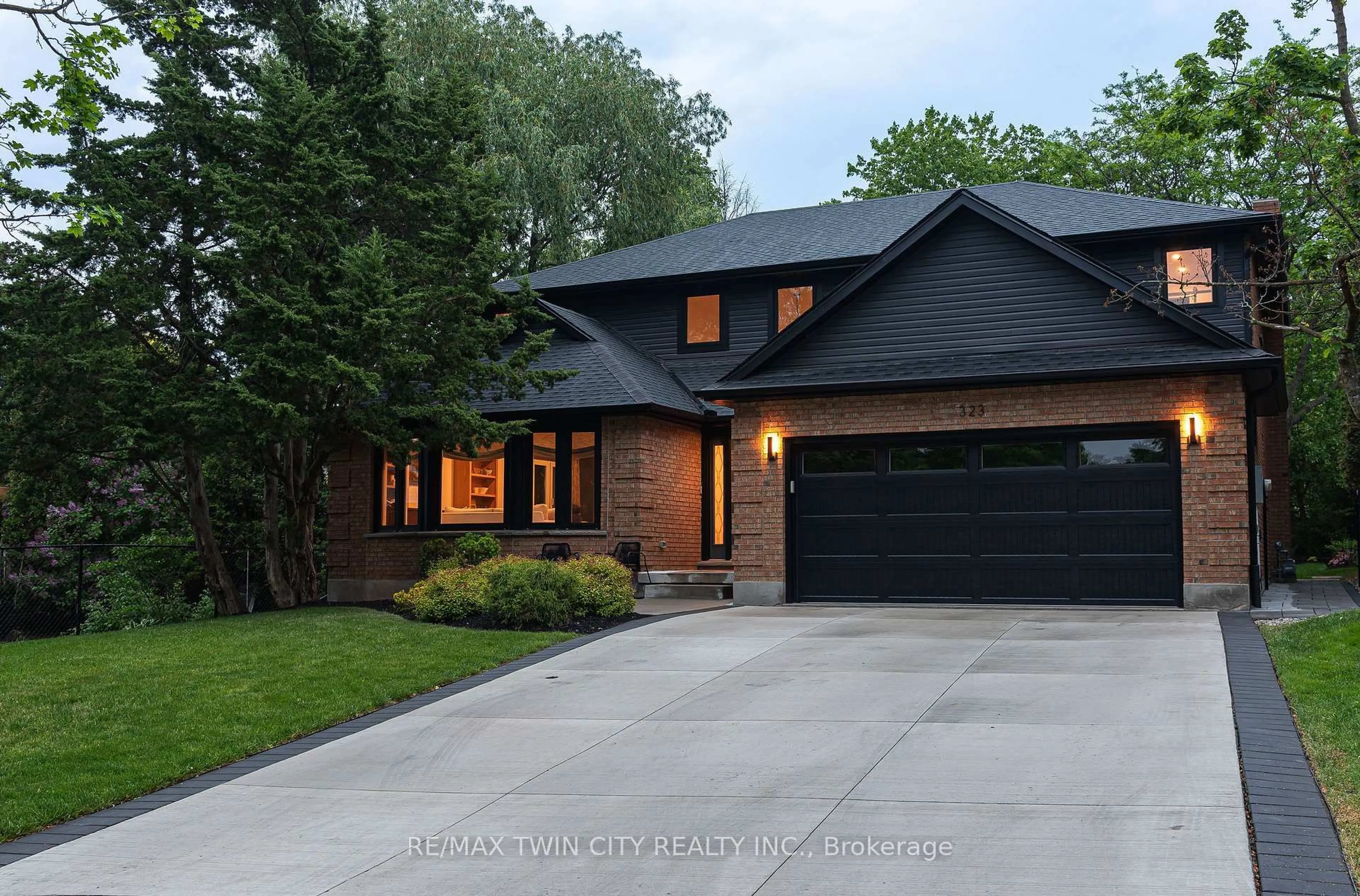 Home with brick exterior material, street for 323 Calvington Pl, Waterloo Ontario N2T 1P9