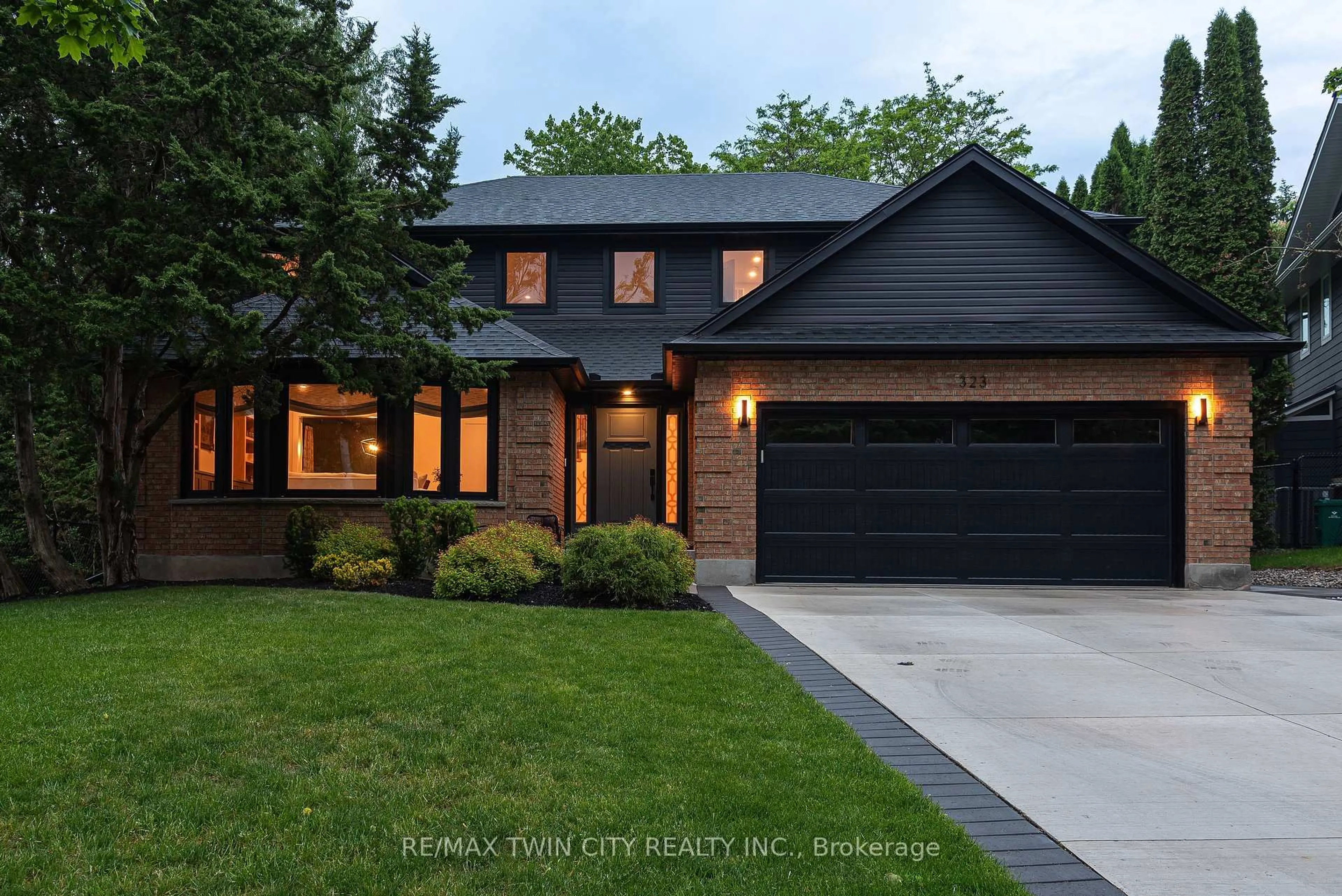 Home with brick exterior material, street for 323 Calvington Pl, Waterloo Ontario N2T 1P9