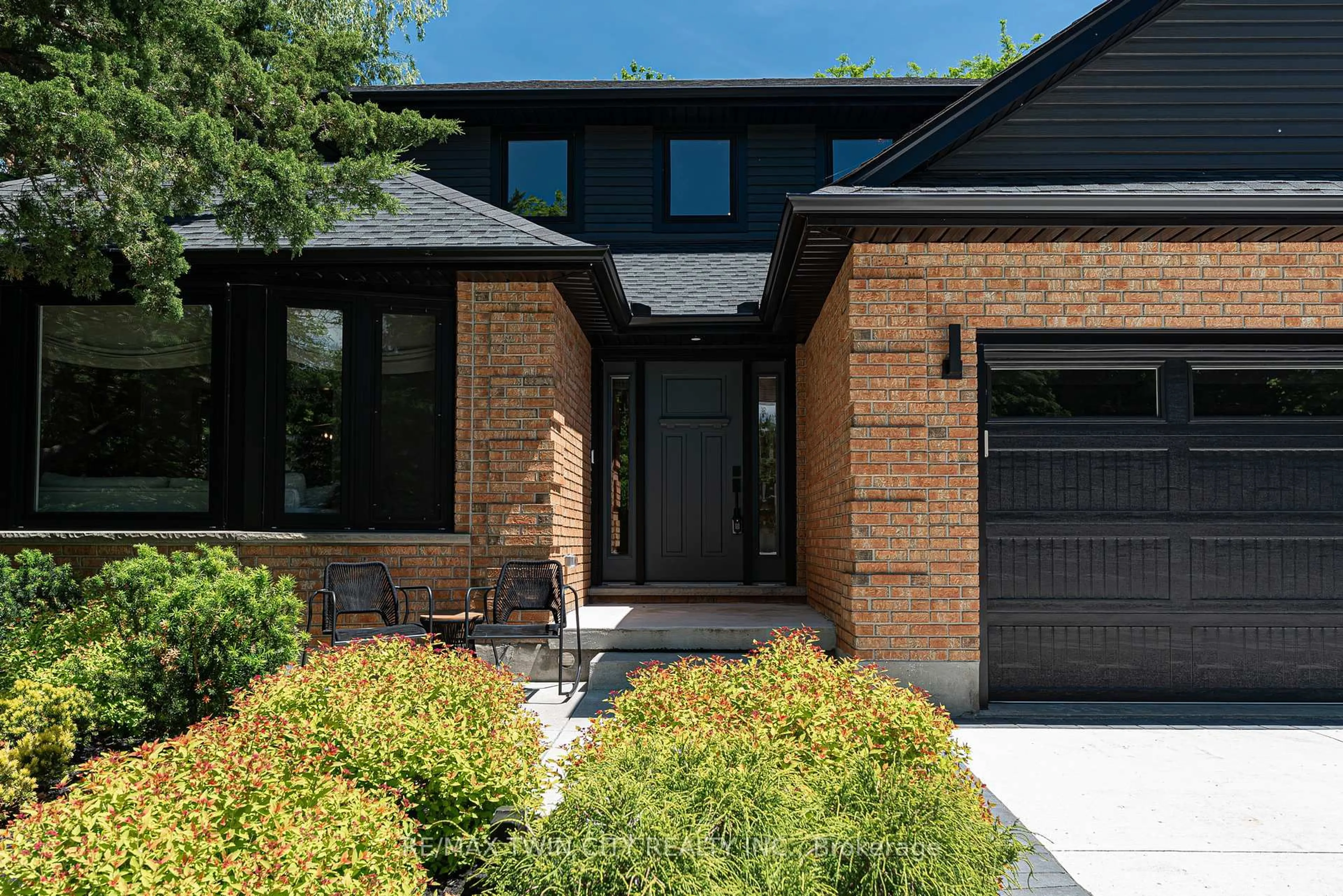 Home with brick exterior material, street for 323 Calvington Pl, Waterloo Ontario N2T 1P9
