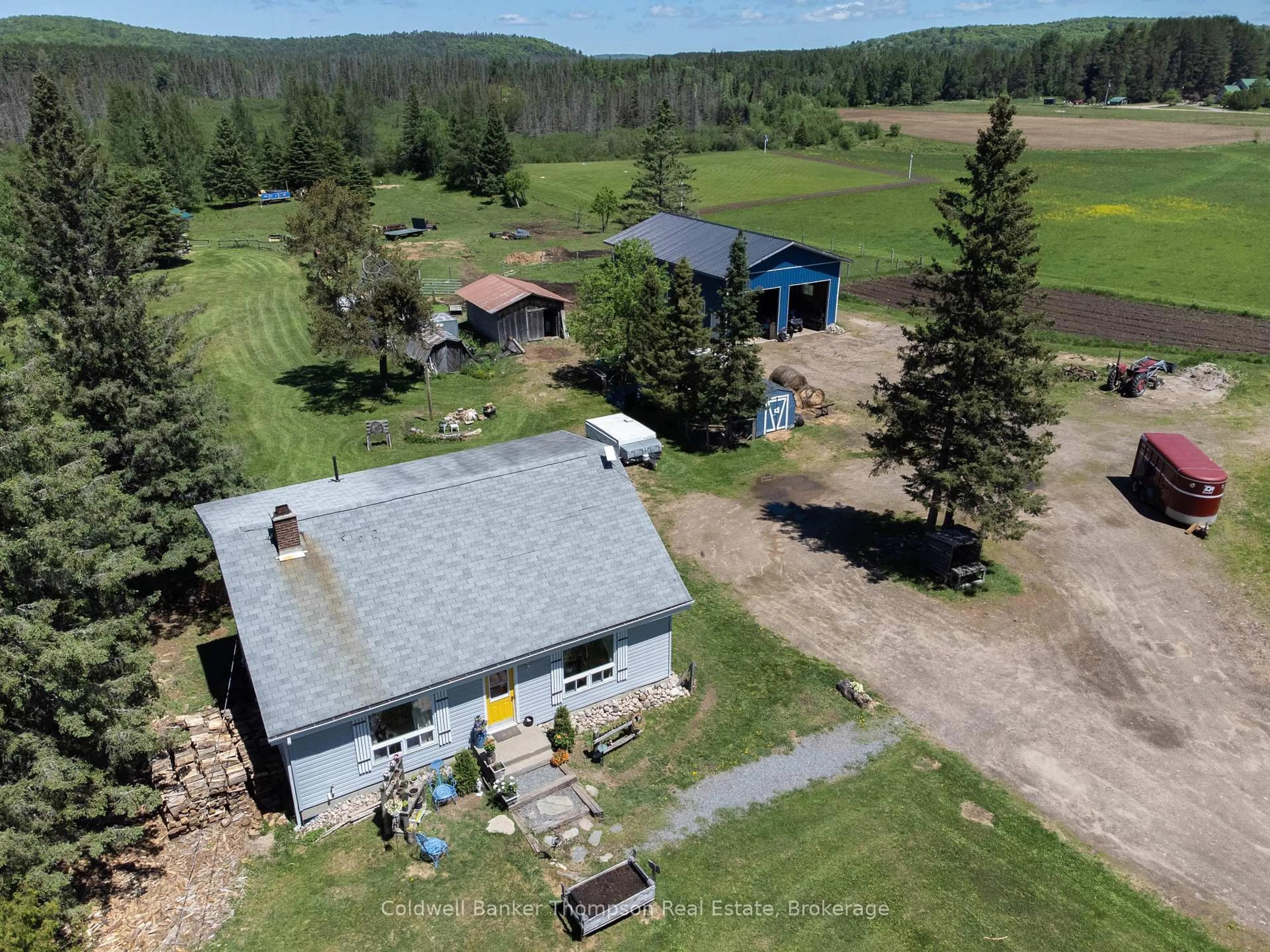 A pic from outside/outdoor area/front of a property/back of a property/a pic from drone, unknown for 1202 Eagle Lake Rd, Machar Ontario P0A 1X0