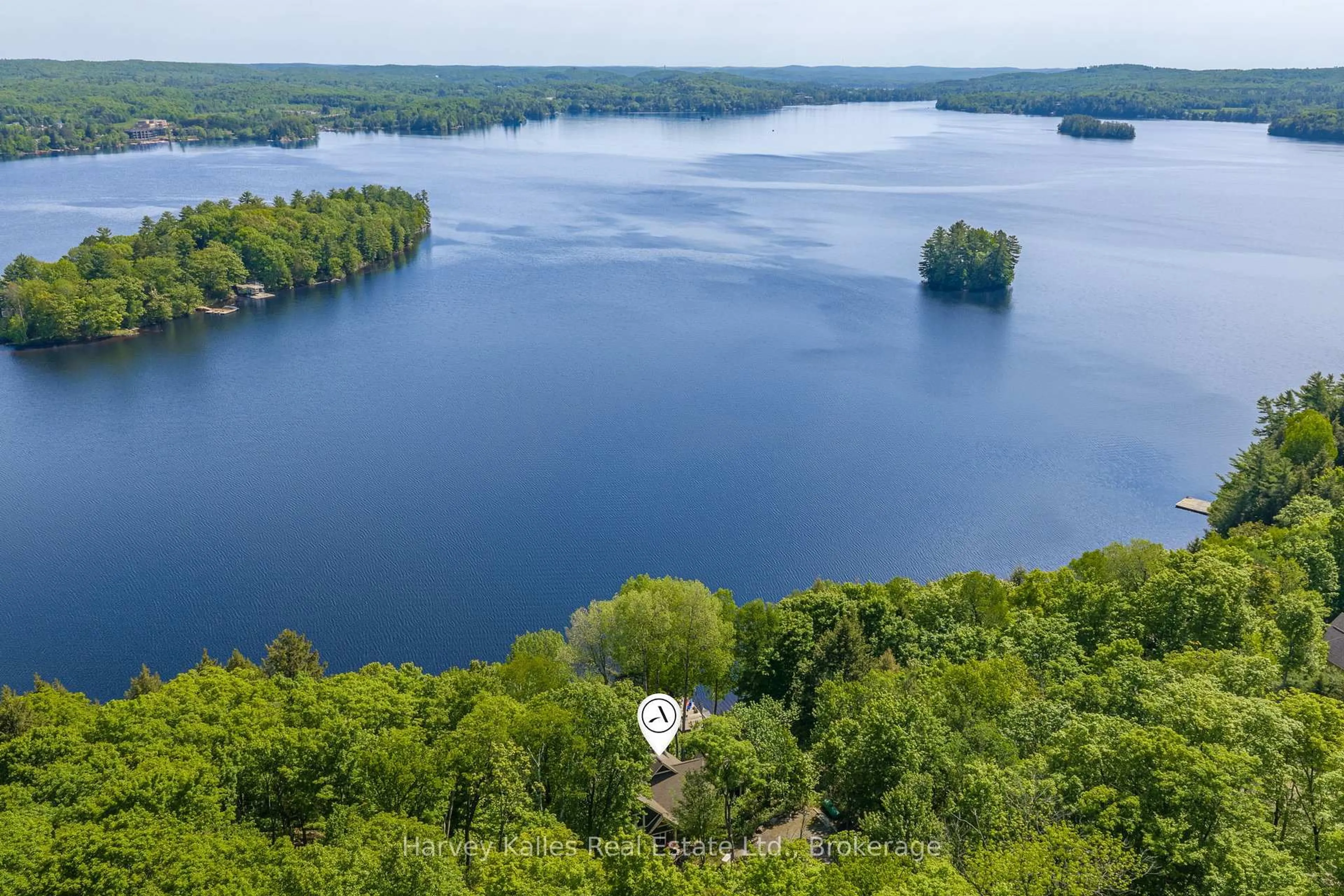 A pic from outside/outdoor area/front of a property/back of a property/a pic from drone, water/lake/river/ocean view for 161 Town Line Rd, Huntsville Ontario P1H 1R1