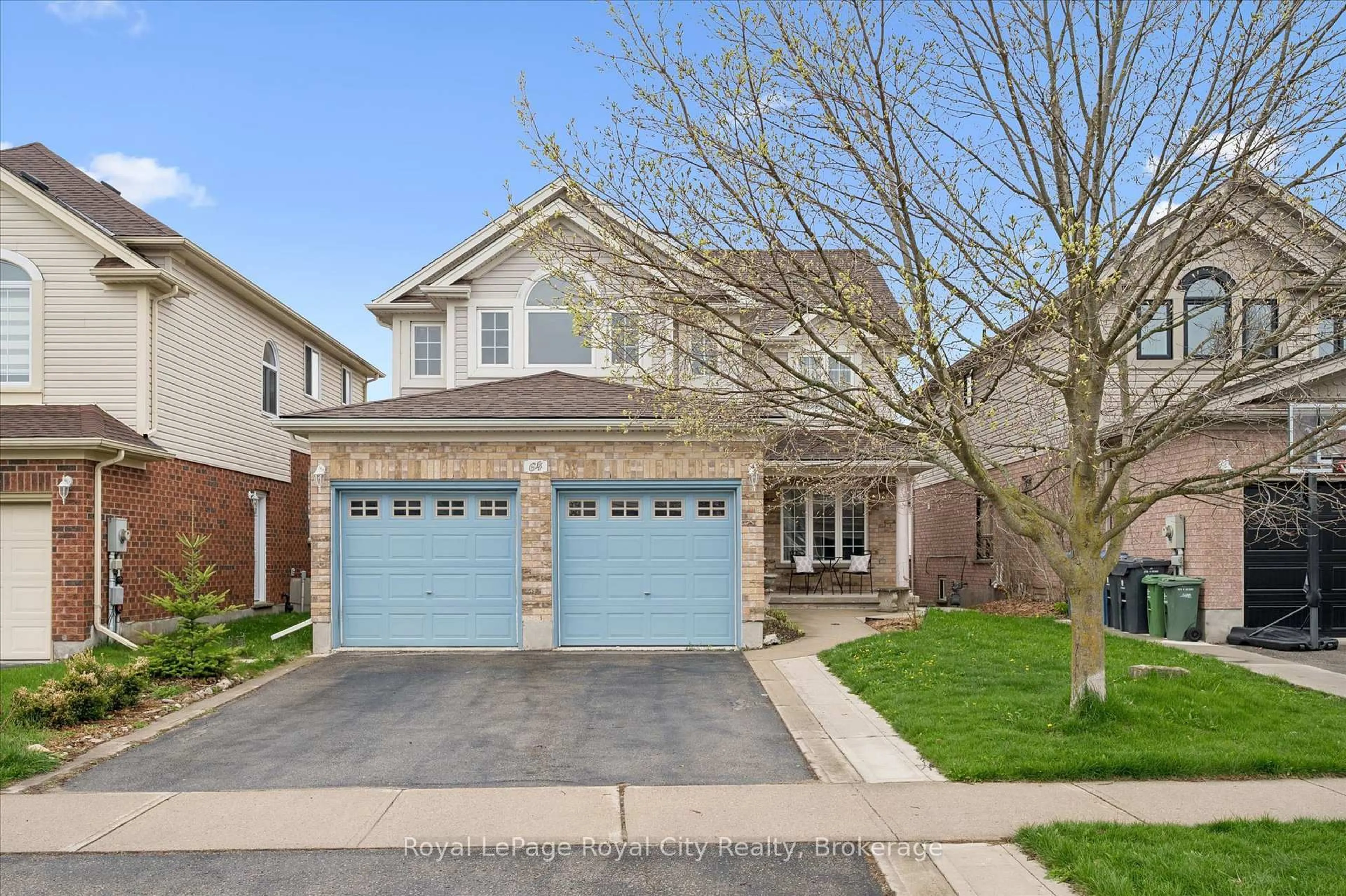 Home with brick exterior material, street for 64 Milson Cres, Guelph Ontario N1C 1G7