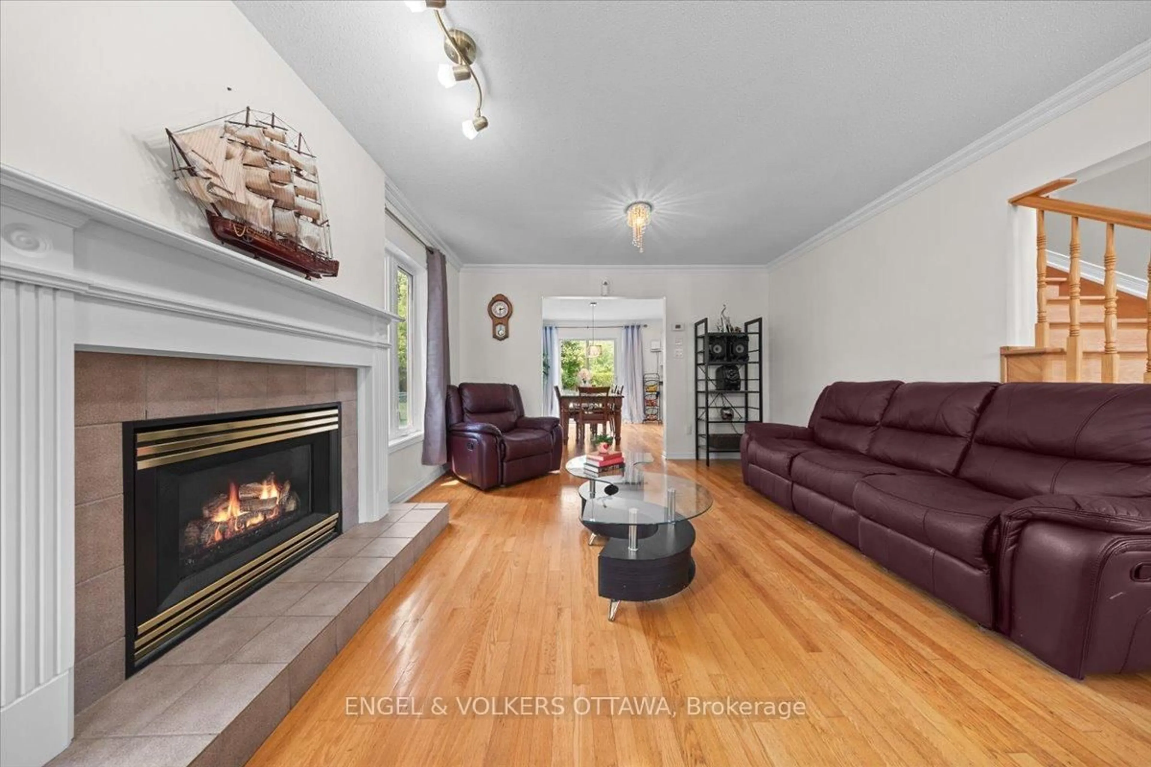 Living room with furniture, wood/laminate floor for 34 Percy St, Casselman Ontario K0A 1M0