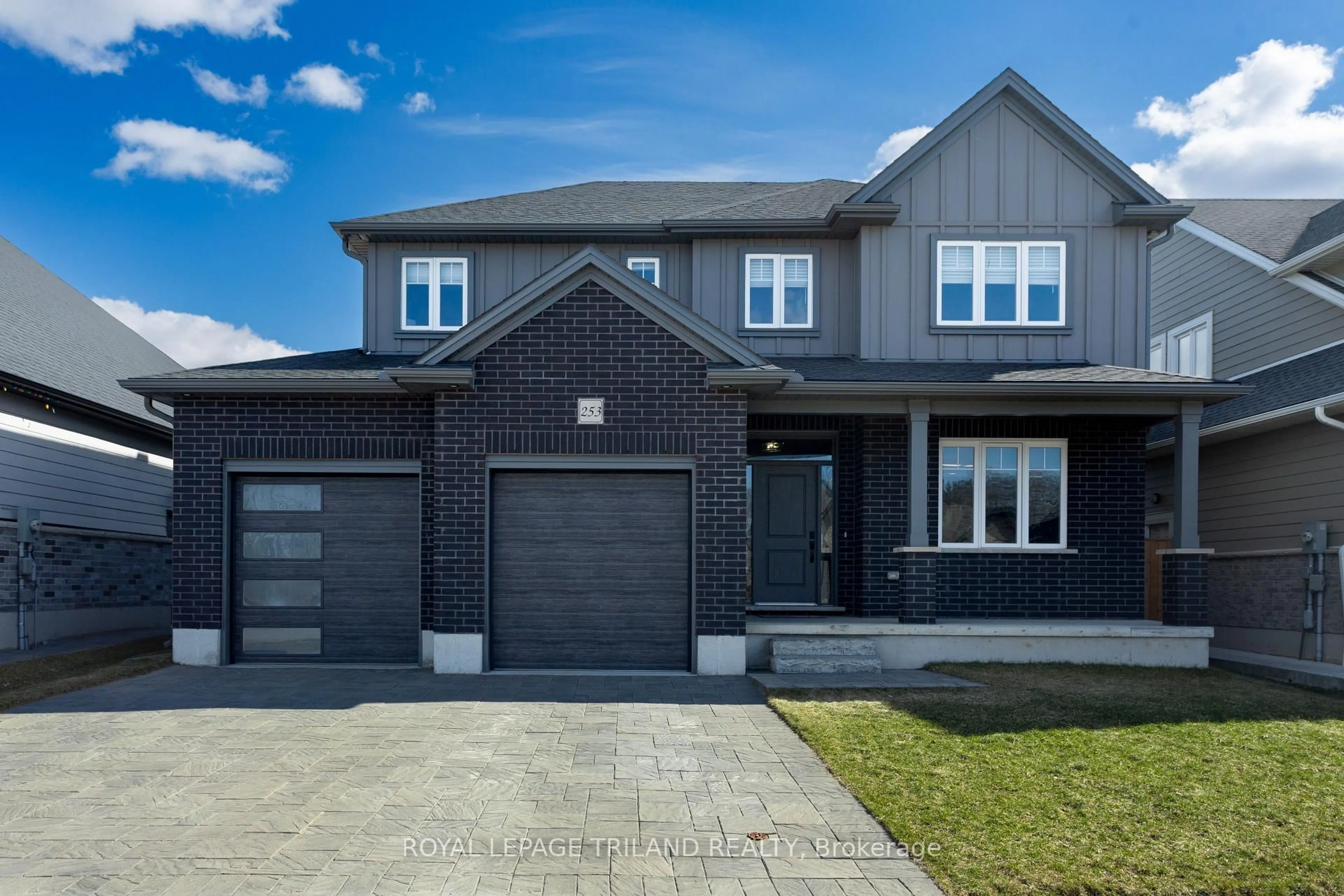 Home with brick exterior material, street for 253 Boardwalk Way, Thames Centre Ontario N0L 1G2
