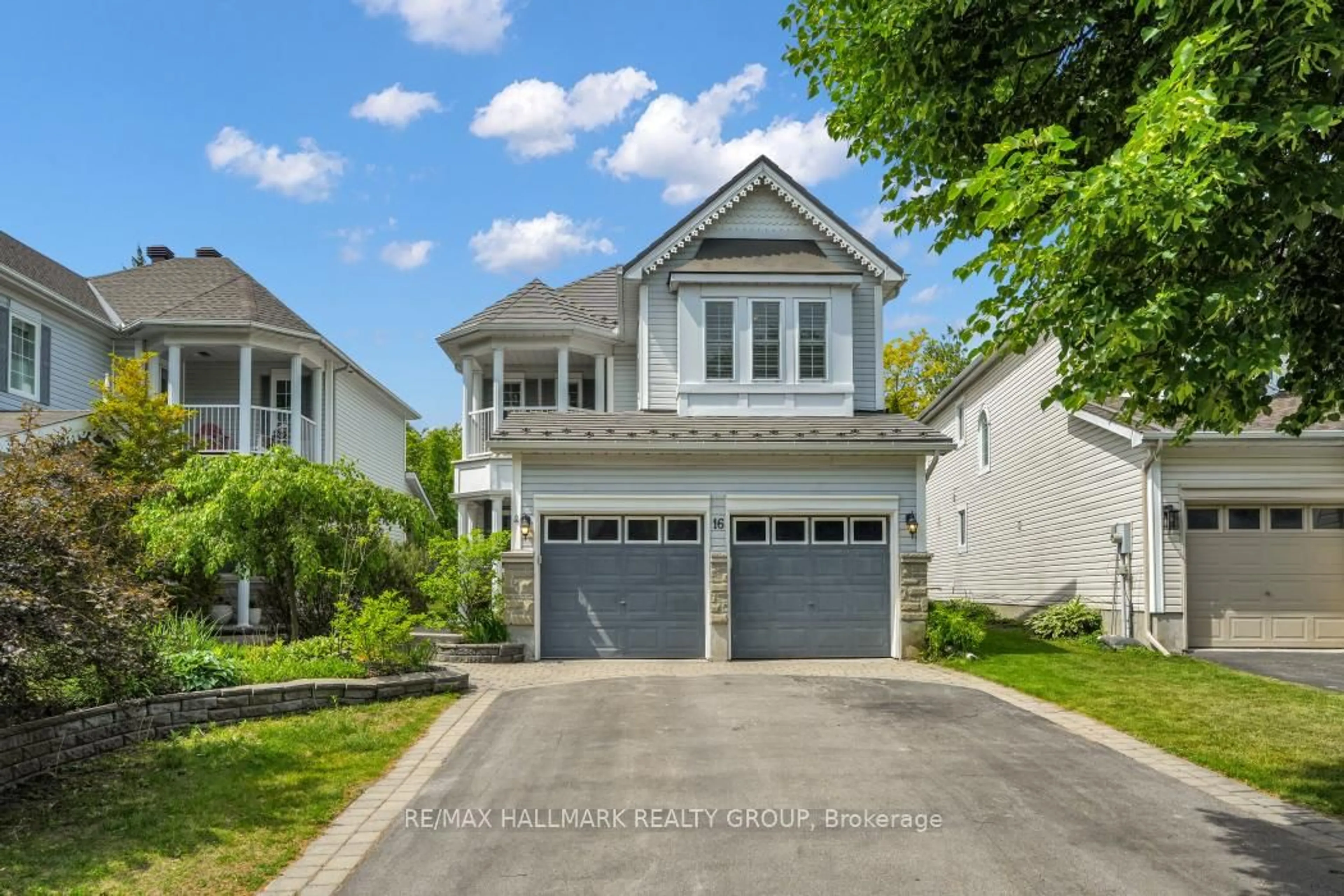 Home with vinyl exterior material, street for 16 Hemlo Cres, Kanata Ontario K2T 1C7