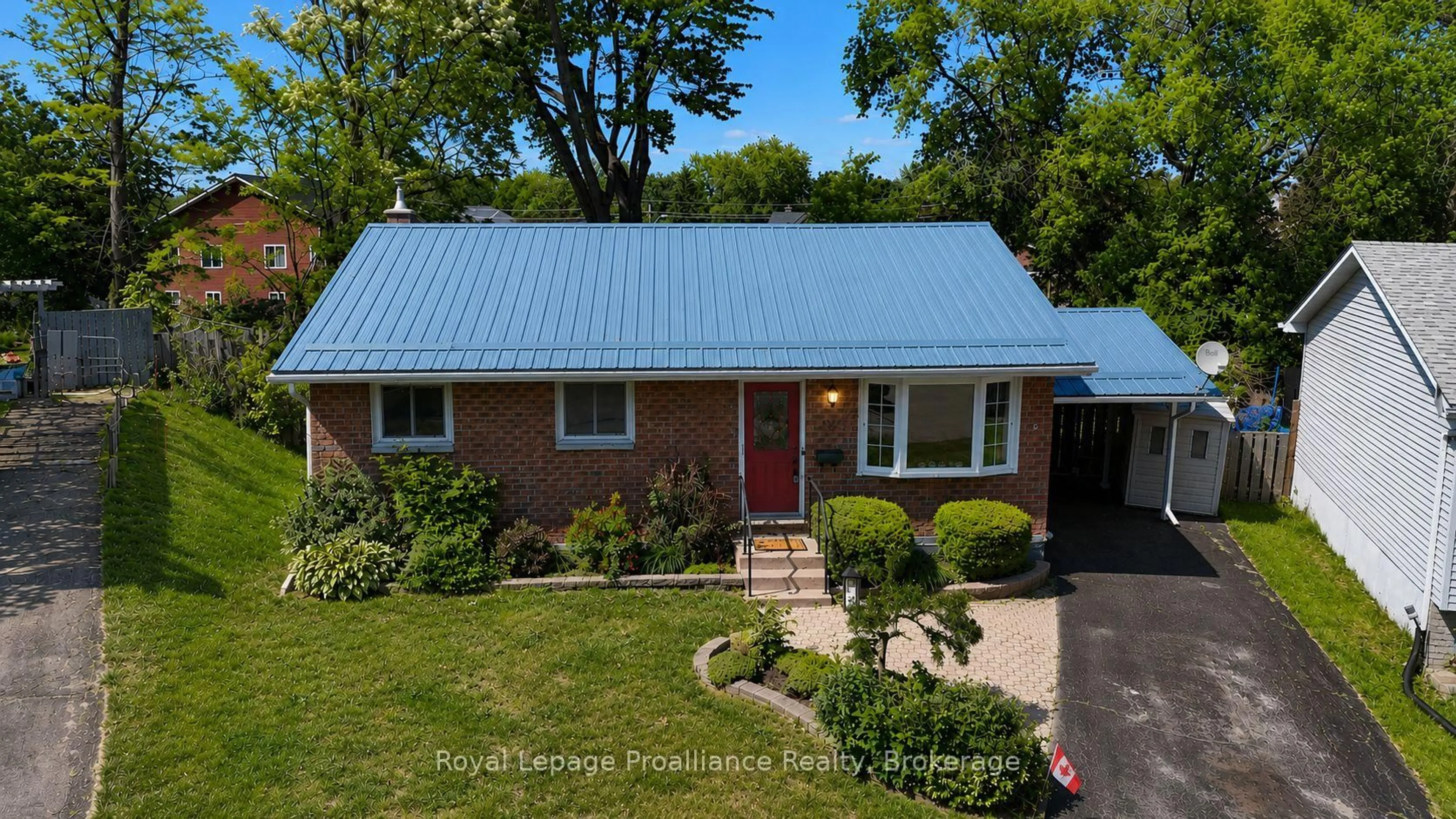 Home with vinyl exterior material, street for 14 Allore Ave, Quinte West Ontario K8V 4W3
