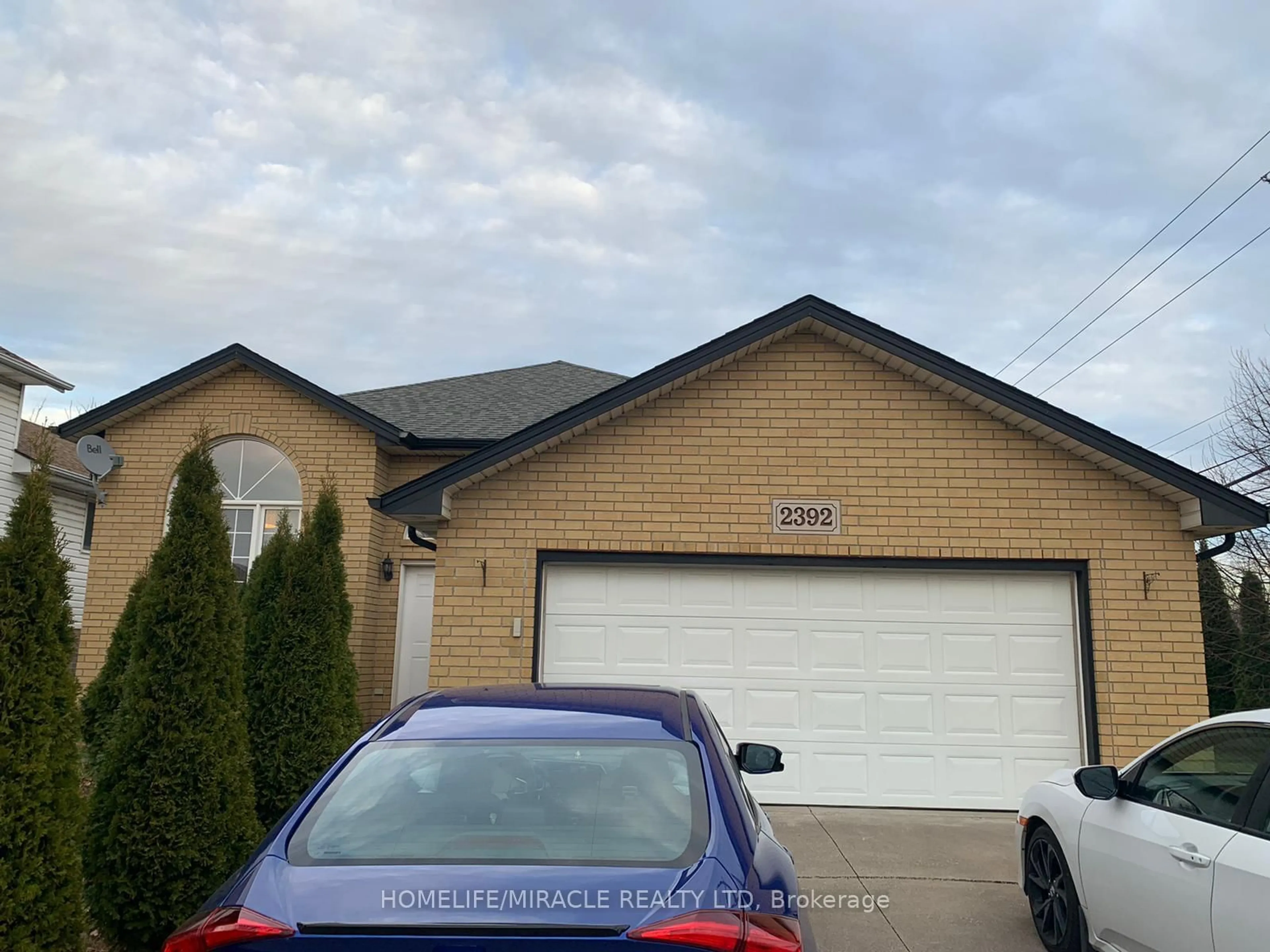 Home with brick exterior material, street for 2392 Askin Ave, Windsor Ontario N9E 4Y2