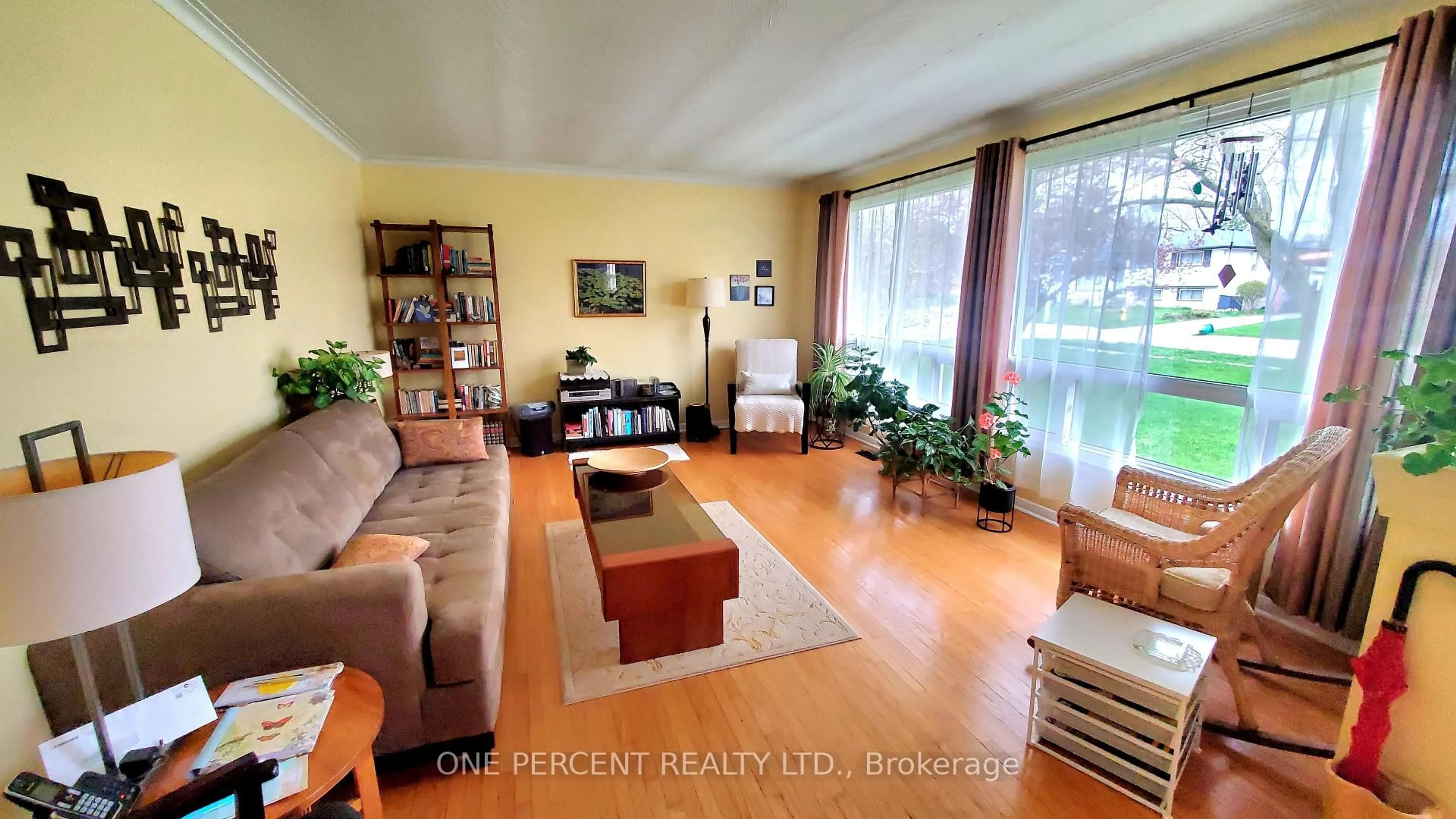 Living room with furniture, wood/laminate floor for 164 Redford Cres, Stratford Ontario N5A 1P2