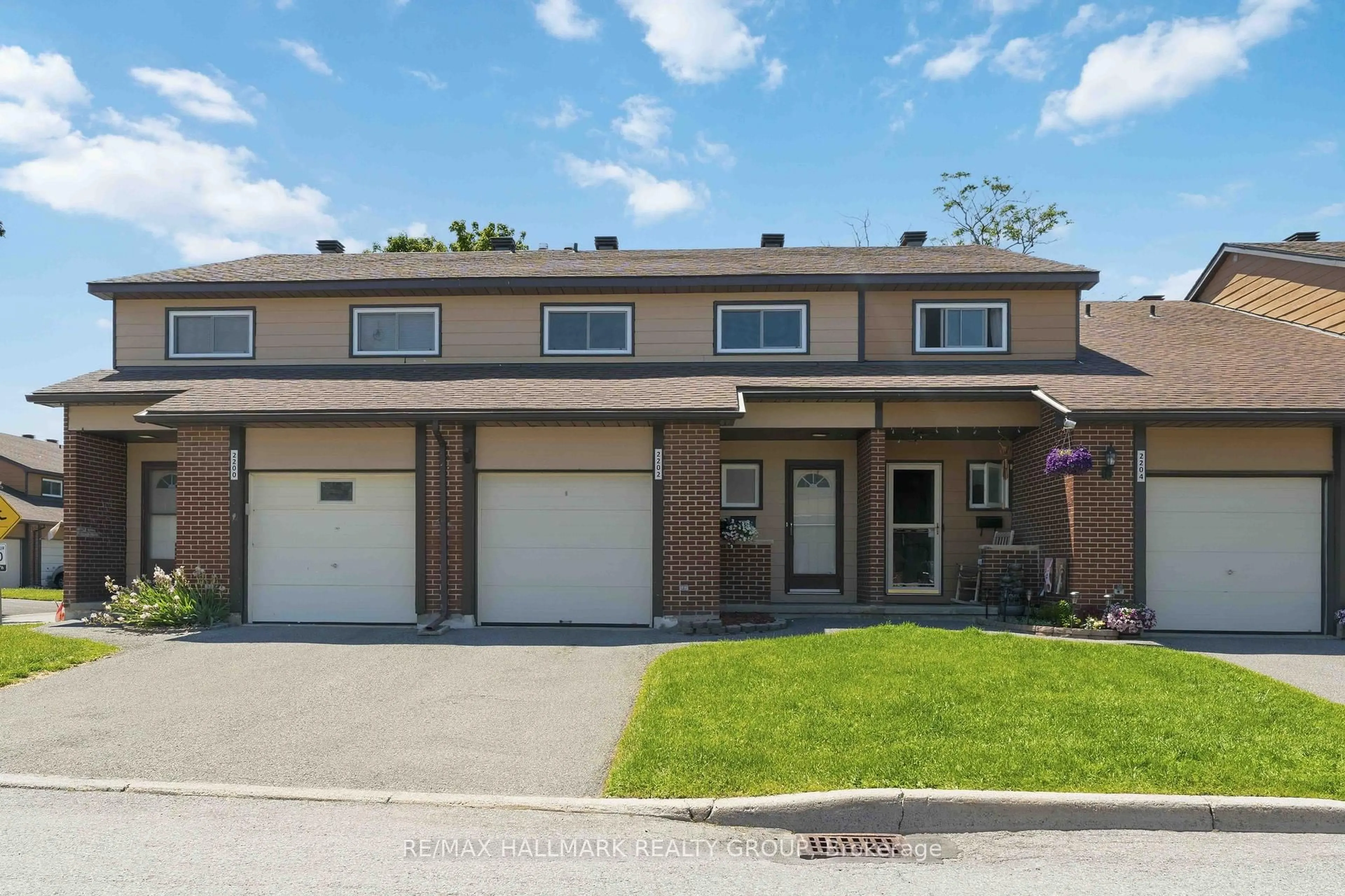 Home with brick exterior material, street for 2202 Orient Park Dr #48, Ottawa Ontario K1B 4W2